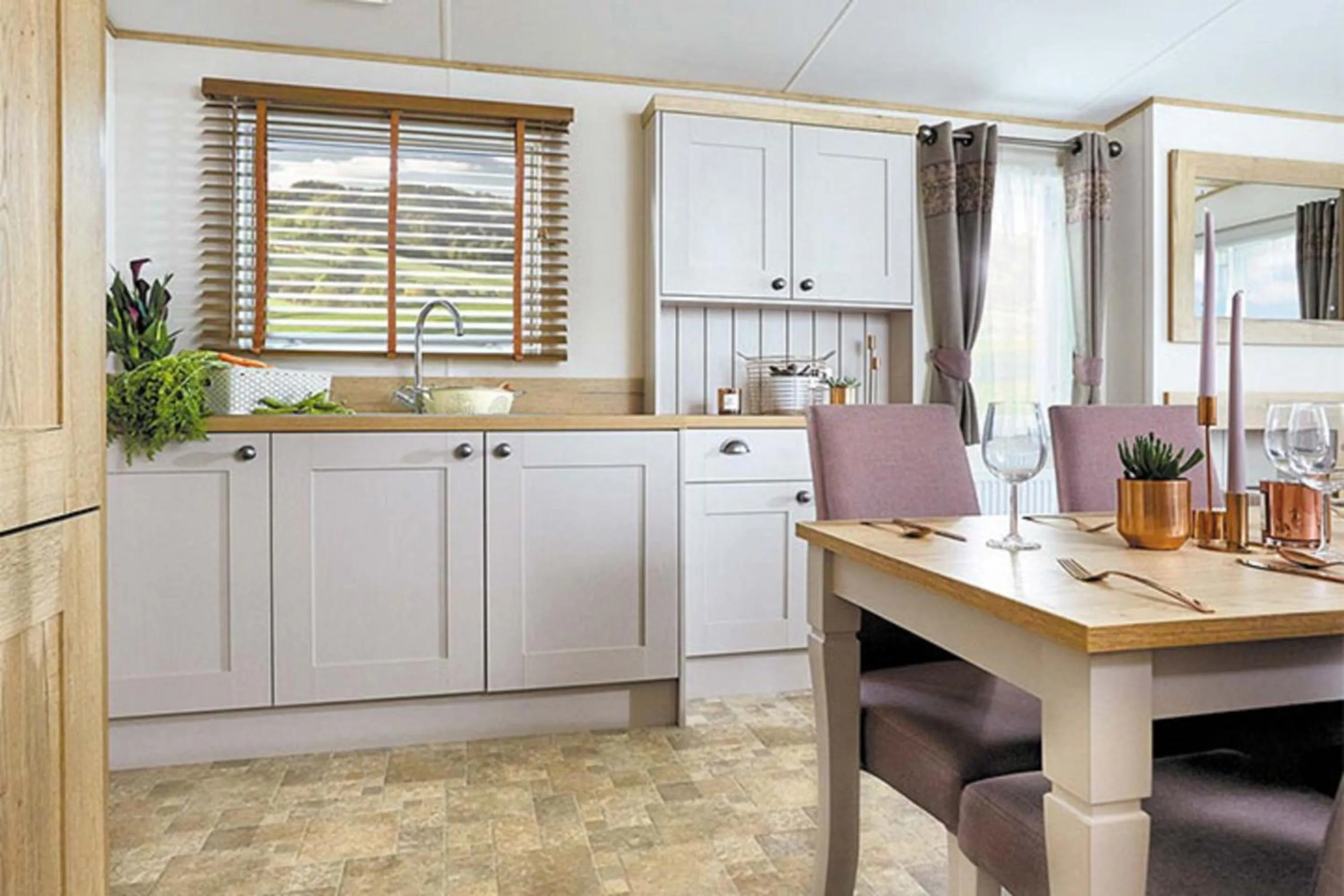 Kitchen or kitchenette in Newperran Holiday Resort