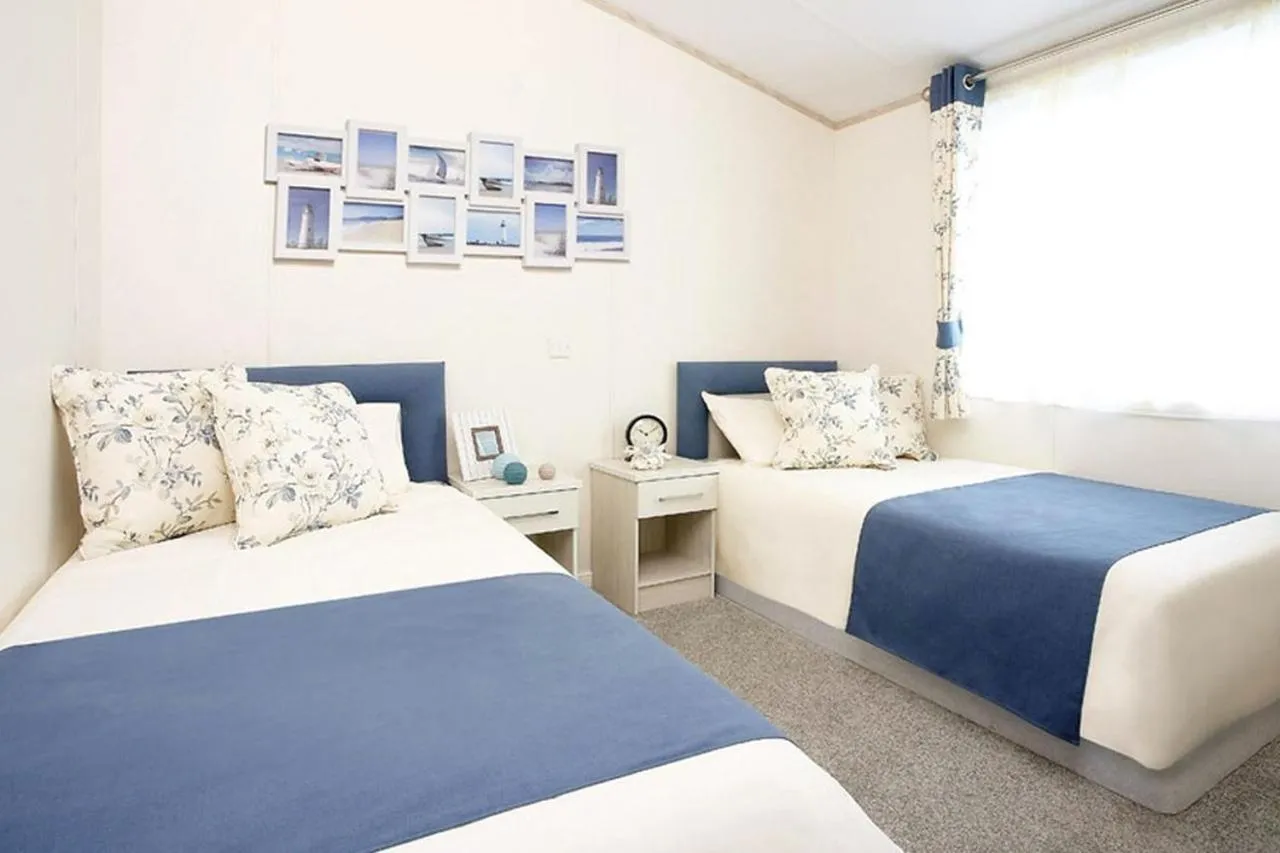 Bed in Newperran Holiday Resort