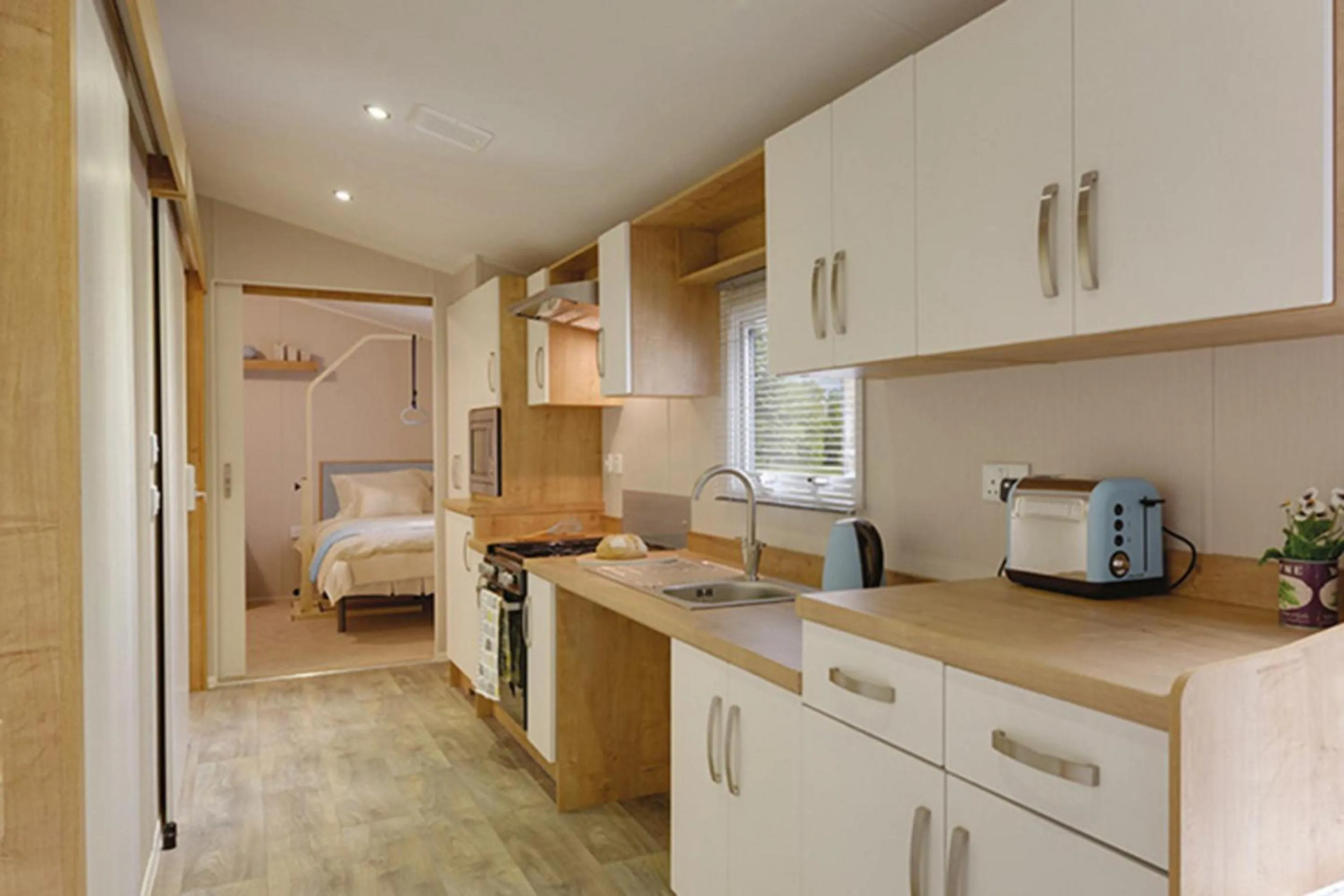 Kitchen or kitchenette in Newperran Holiday Resort