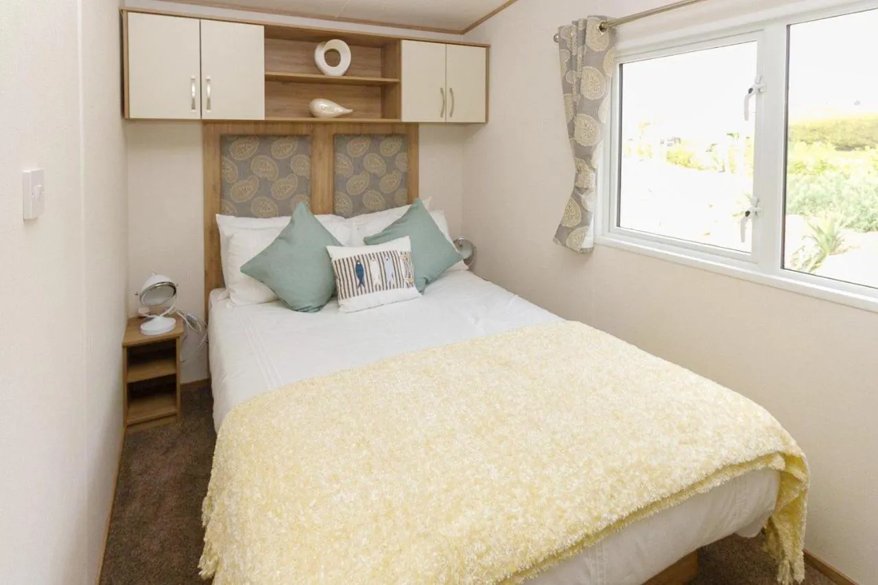 Bed in Newperran Holiday Resort