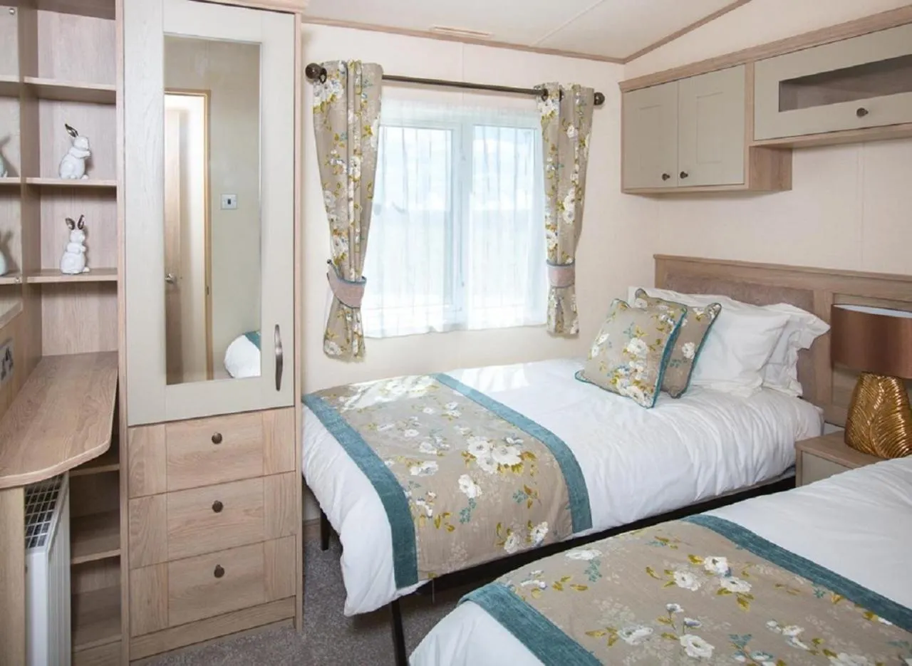 Bed in Newperran Holiday Resort