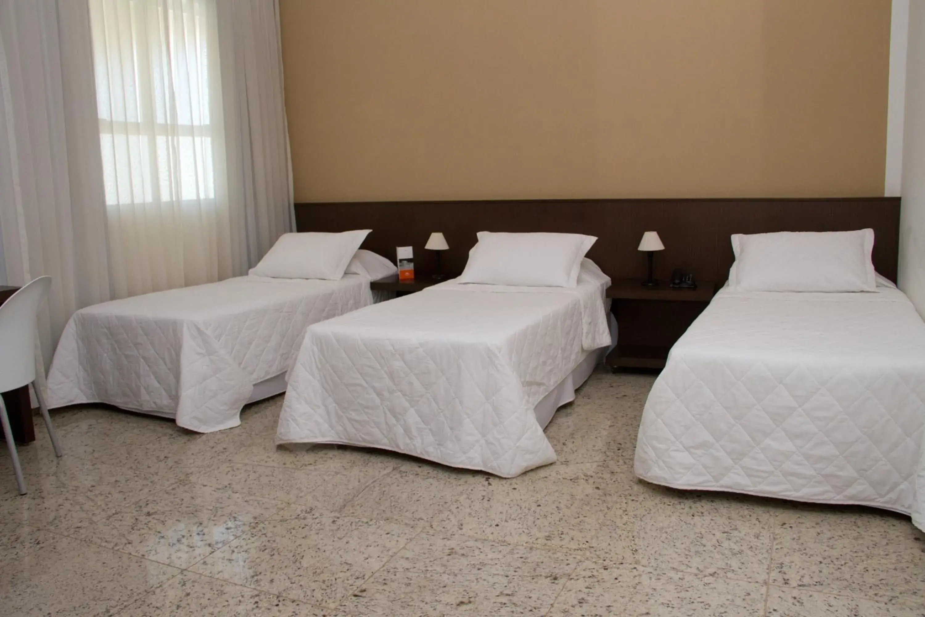 Standard Triple Room in Santorini Hotel Standard Triple Room in Santorini Hotel