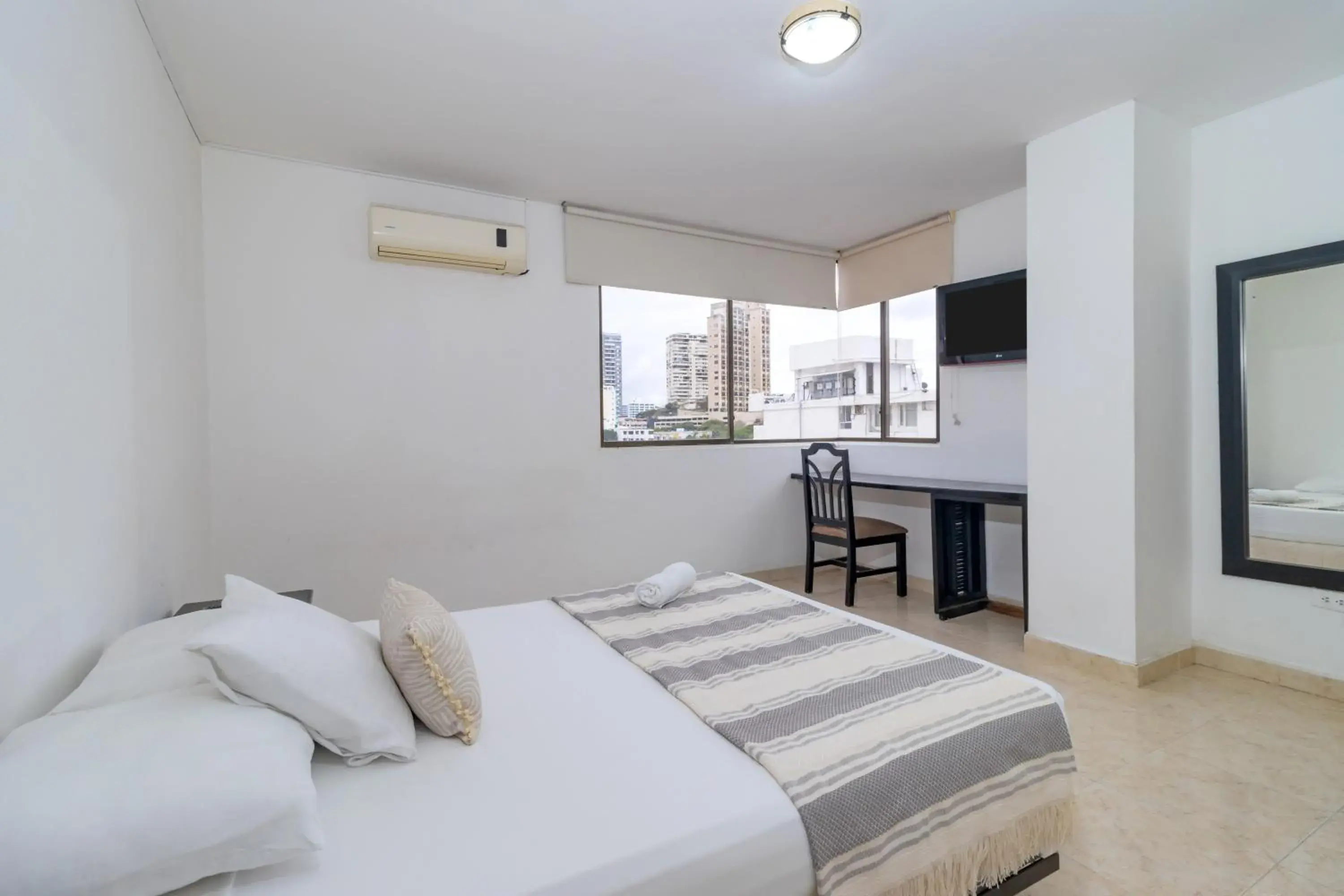 Bed in Hotel Axis Inn By GEH Suites Bed in Hotel Axis Inn By GEH Suites