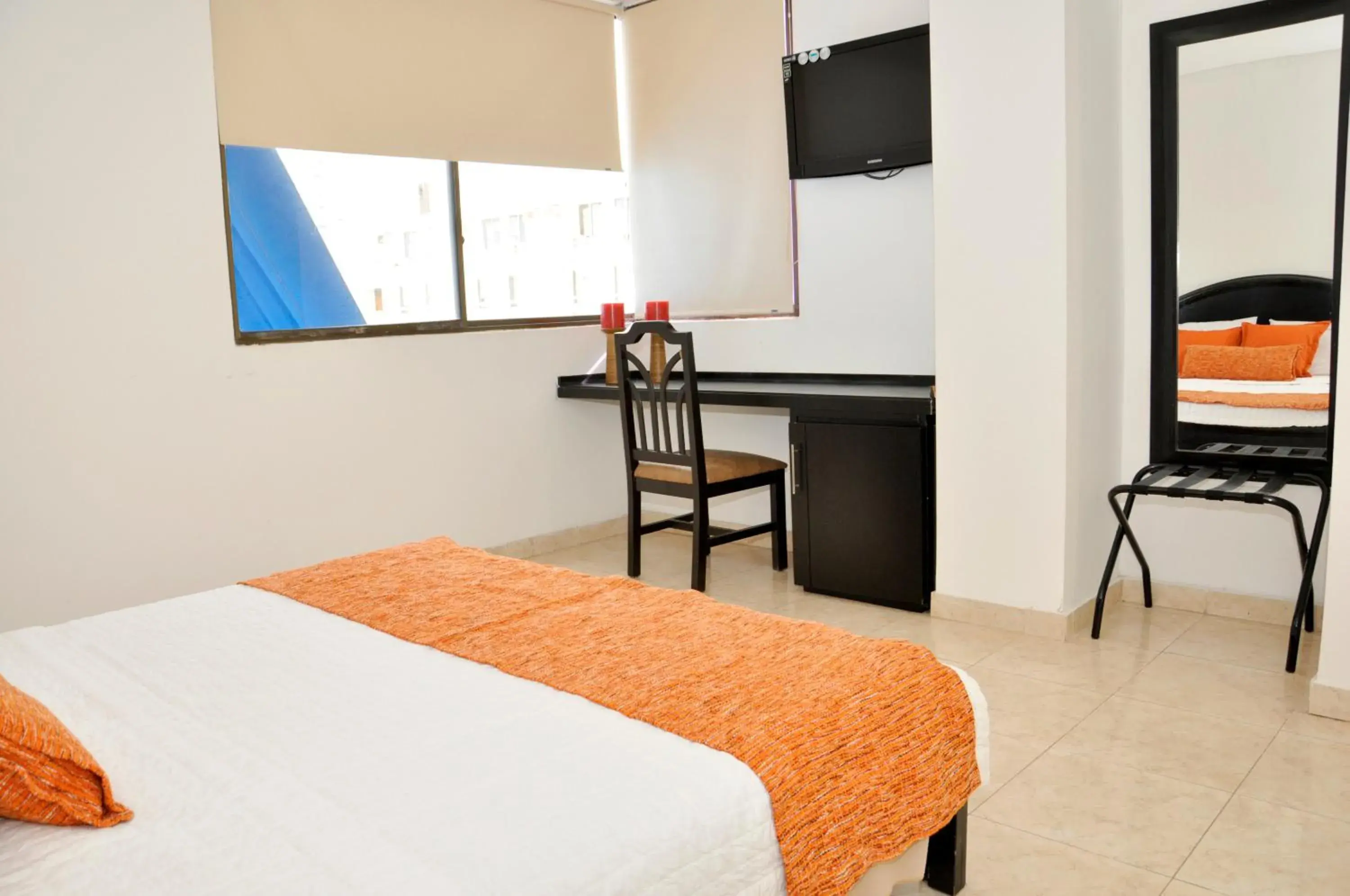 Bed in Hotel Axis Inn By GEH Suites Bed in Hotel Axis Inn By GEH Suites