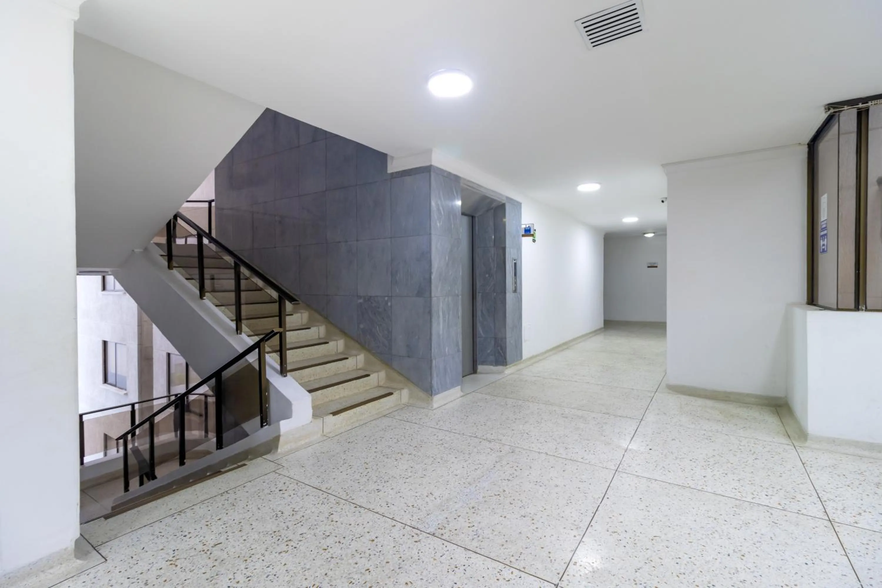 Property building in Hotel Axis Inn By GEH Suites