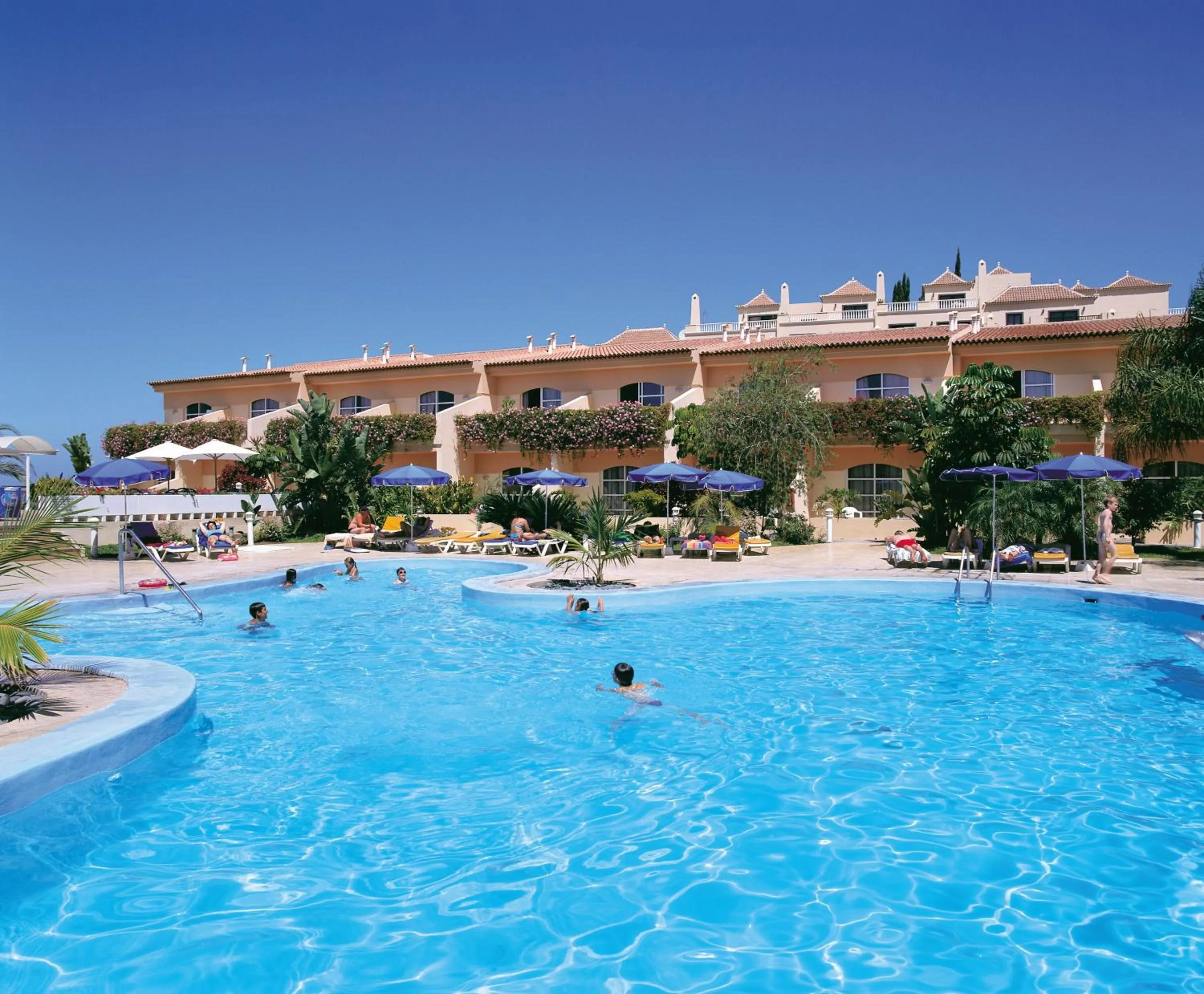 Swimming pool in Apartamentos Jardín del Conde