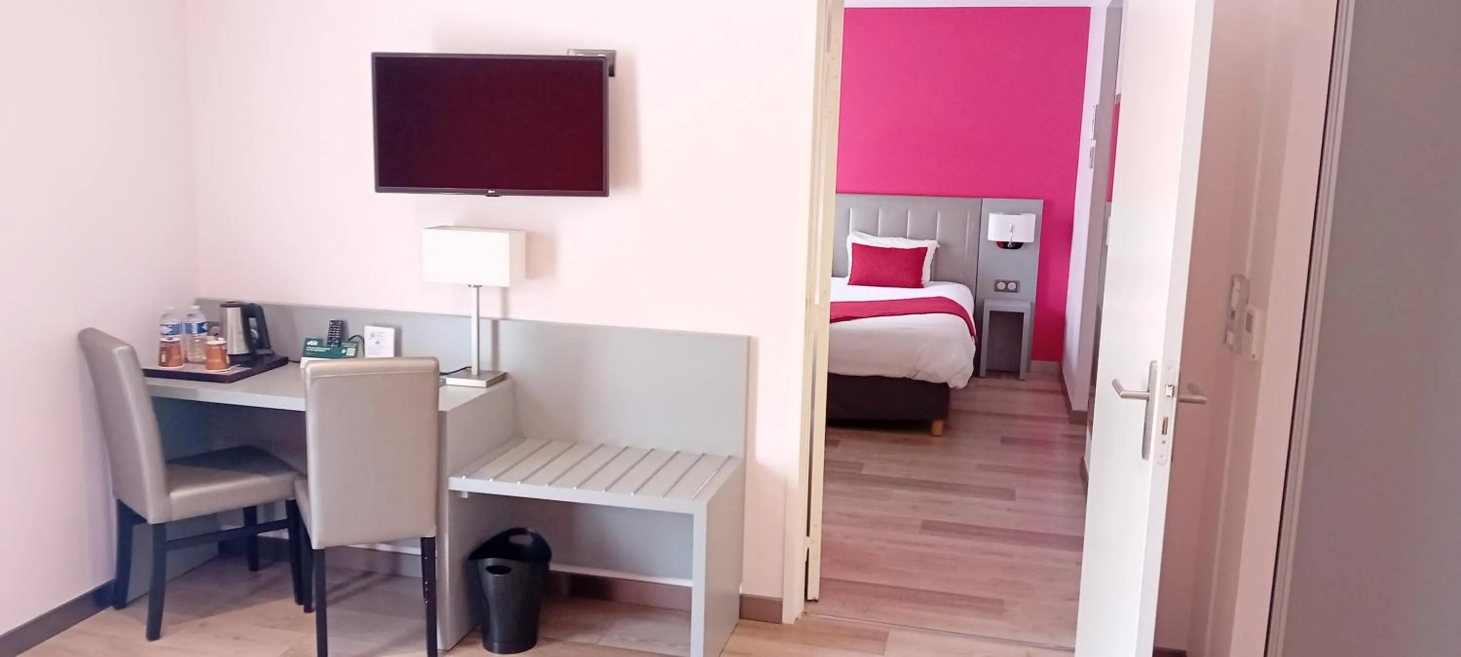 Seating area, Bed in Logis Hôtel Restaurant Le Moulin de la Coudre