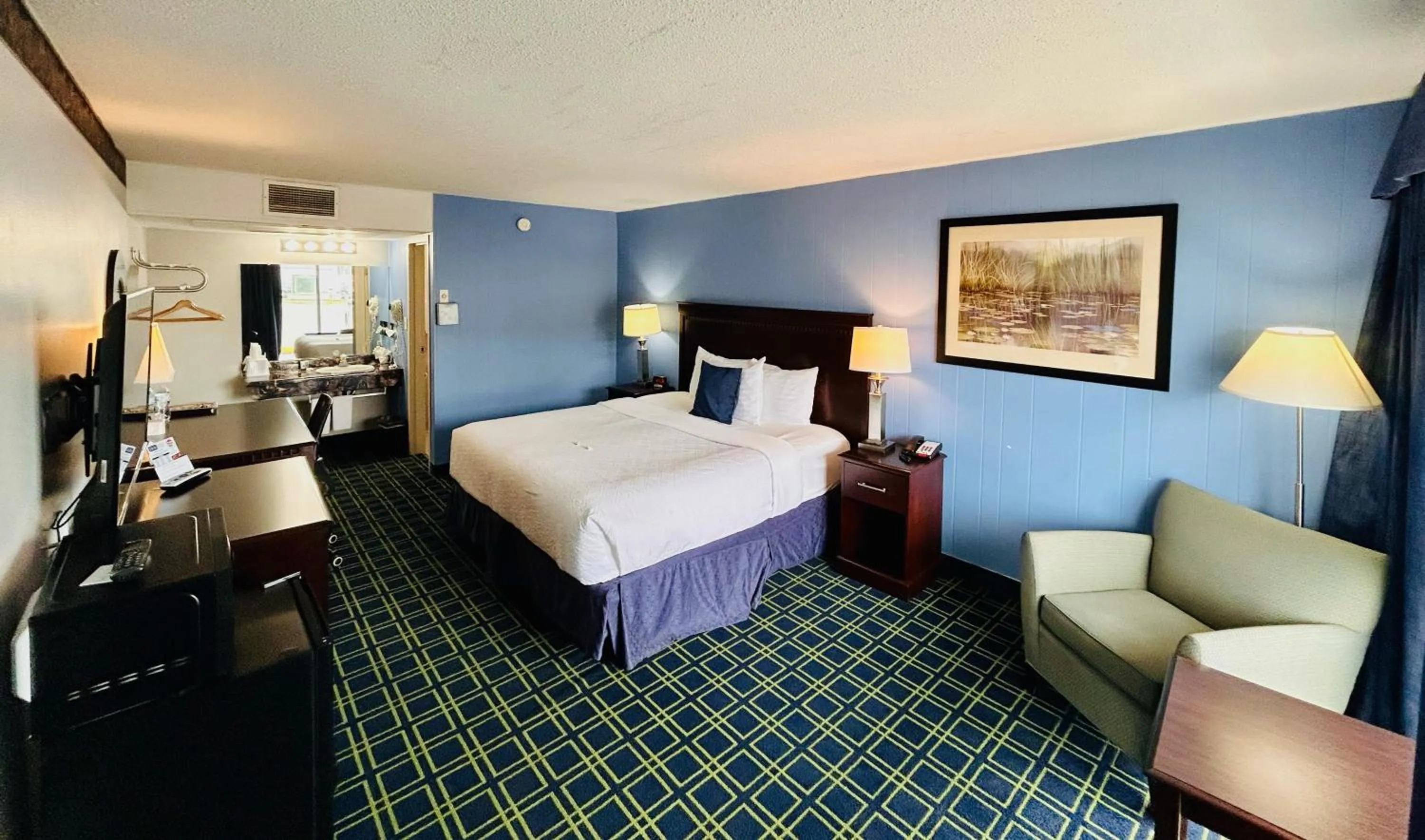 Photo of the whole room, Bed in Hospitality Inn