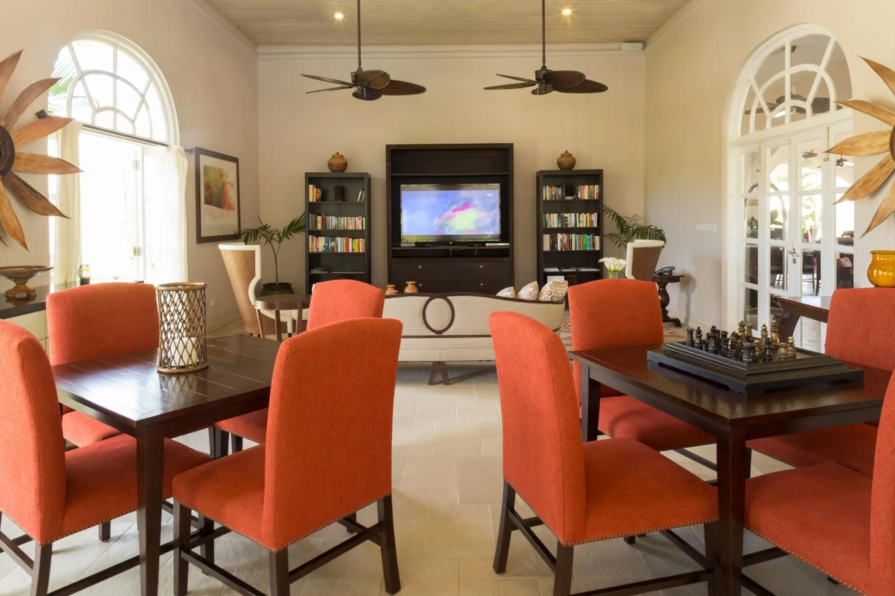 Communal lounge/ TV room in Spice Island Beach Resort
