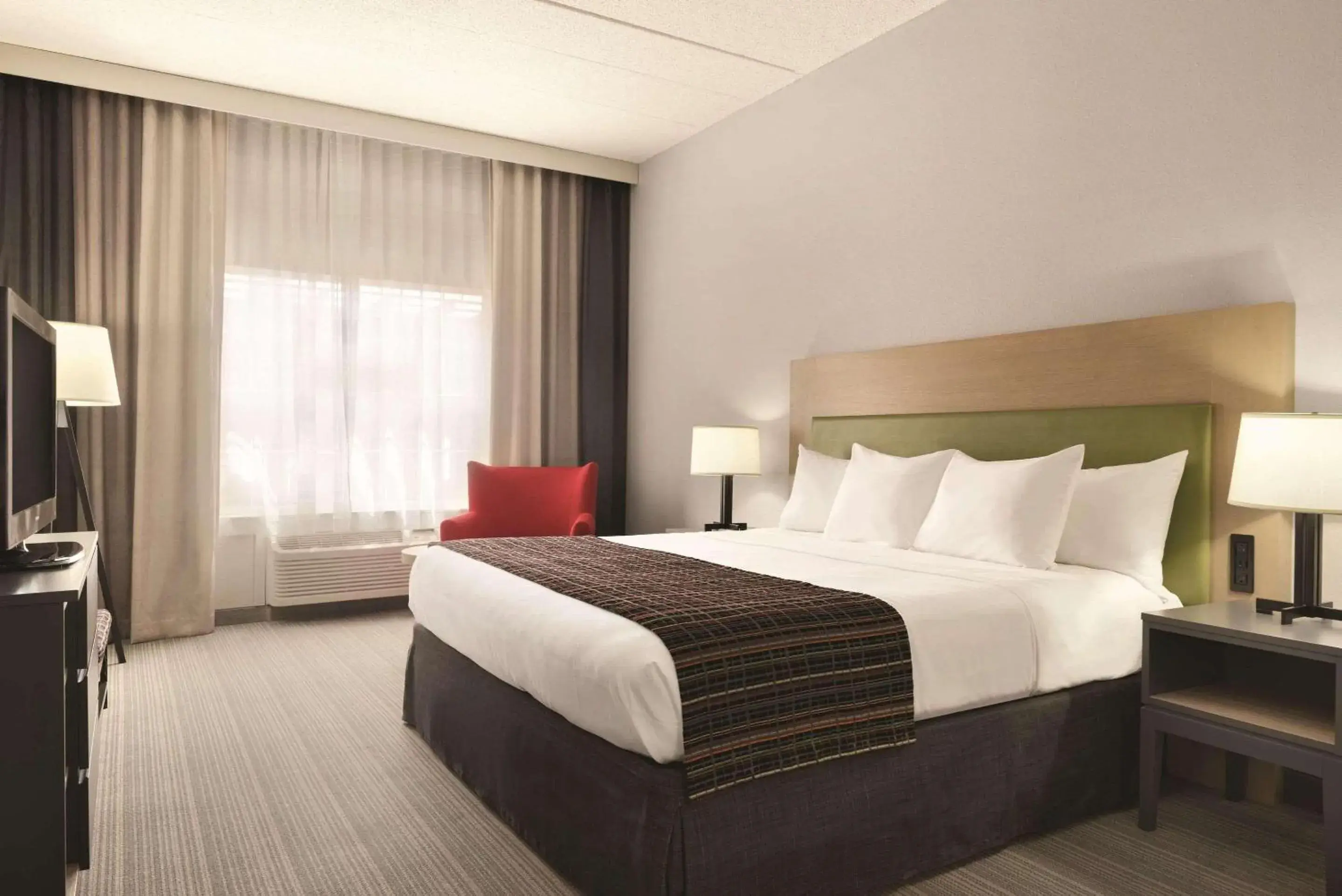 Bedroom, Bed in Country Inn & Suites by Radisson, Coralville, IA Bedroom, Bed in Country Inn & Suites by Radisson, Coralville, IA