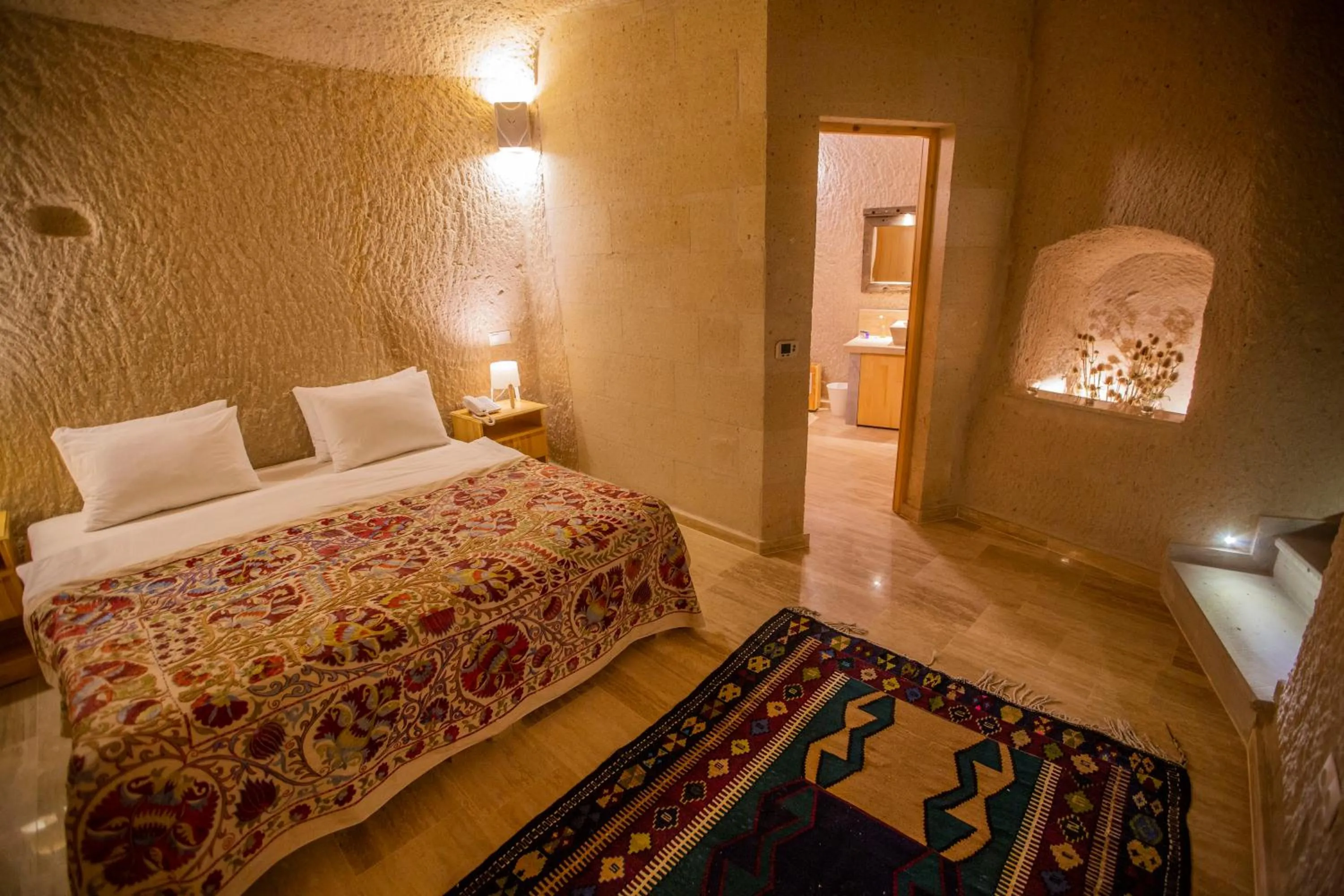Bed in Maze Of Cappadocia Hotel