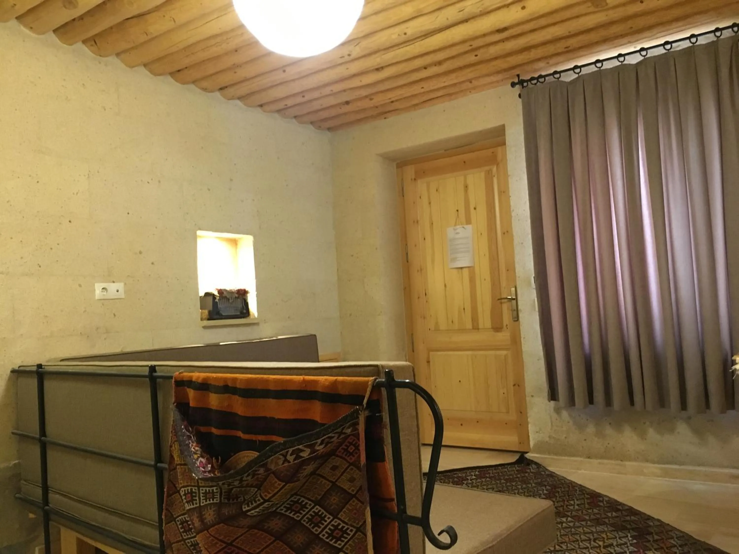 Seating area, Bed in Maze Of Cappadocia Hotel