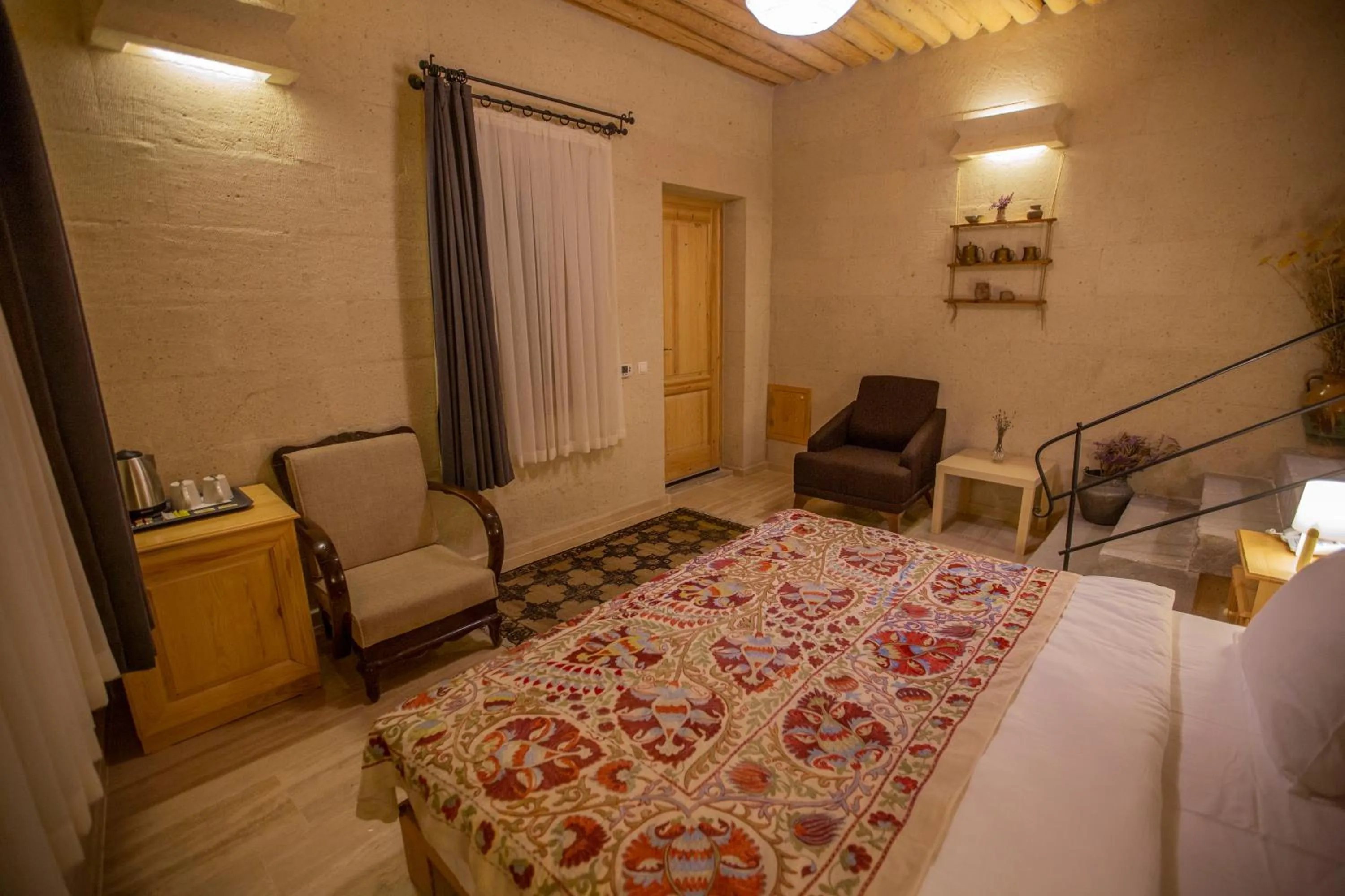 Seating area, Bed in Maze Of Cappadocia Hotel