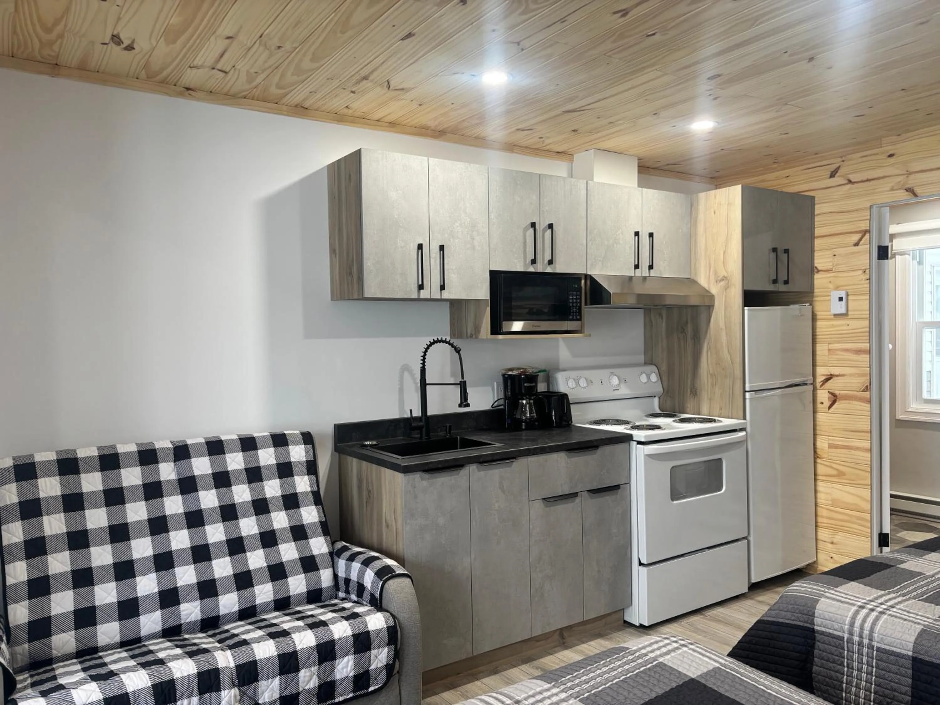 Kitchen or kitchenette in Les studios de la mer