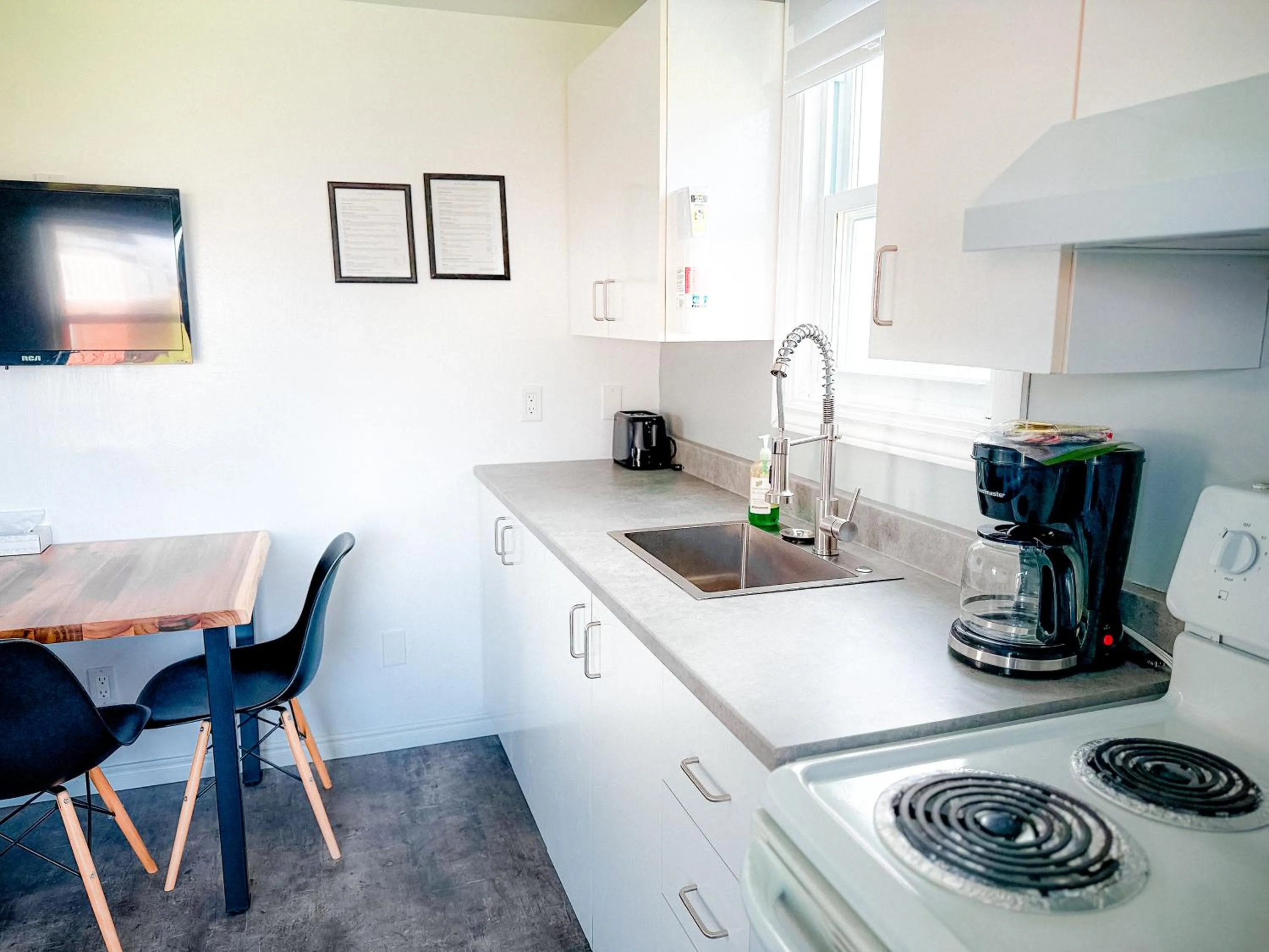 Kitchen or kitchenette in Les studios de la mer