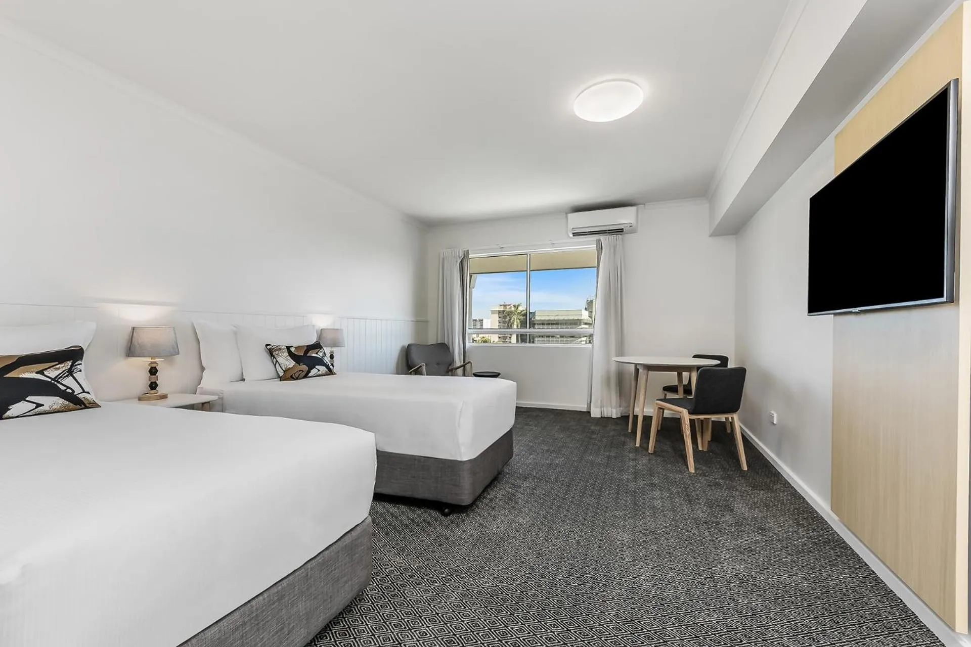 Bed in The Leea Resort Darwin