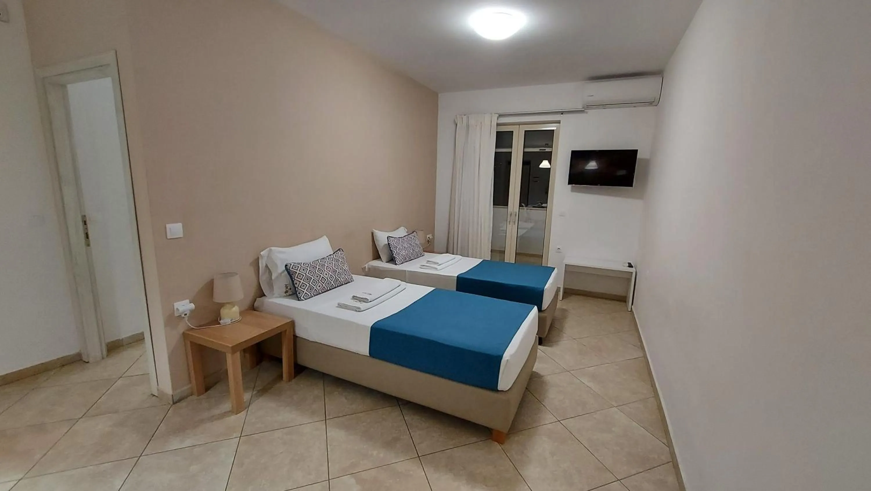 Bed in Argiri Apartments & Suites