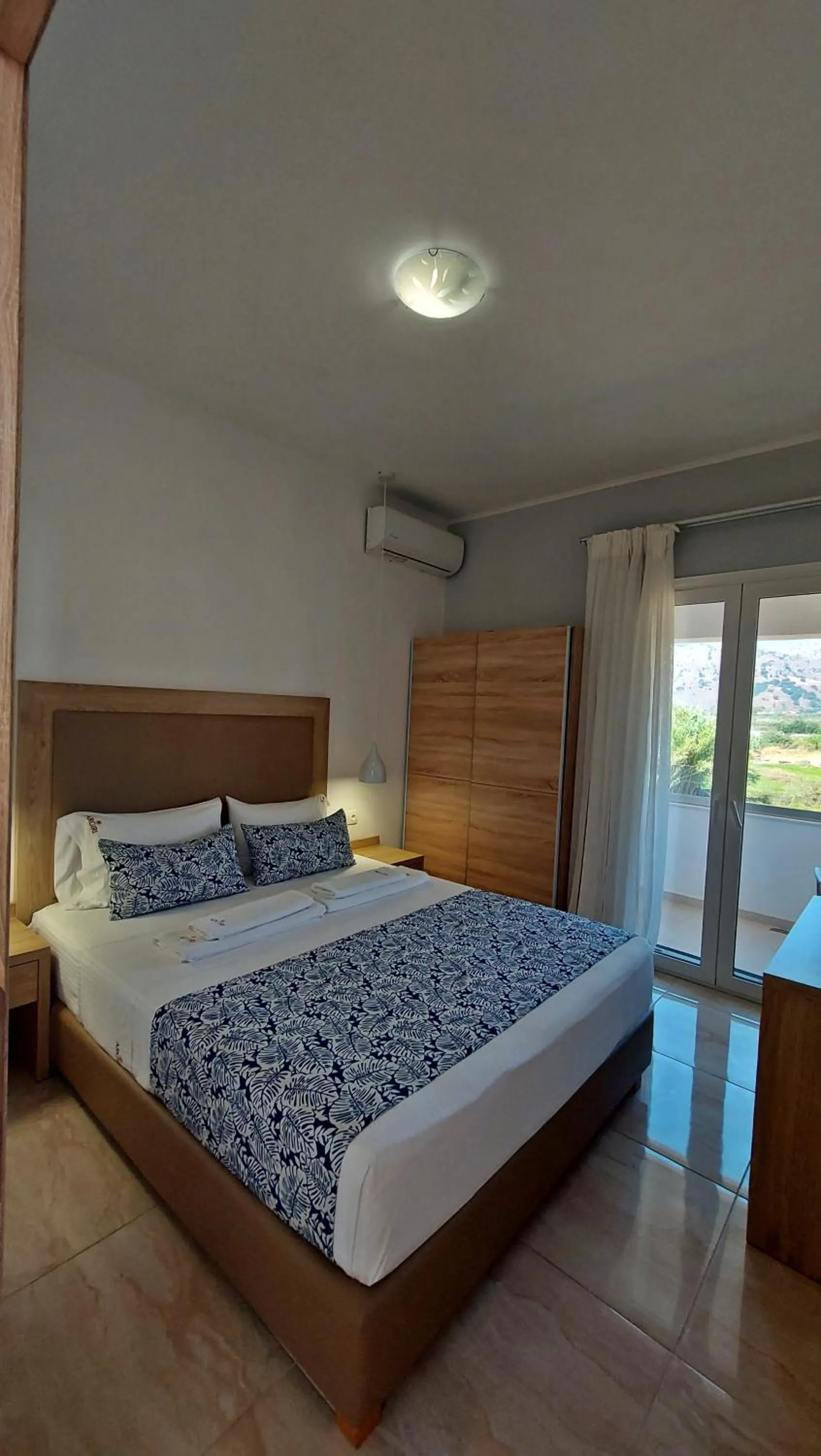 Bed in Argiri Apartments & Suites