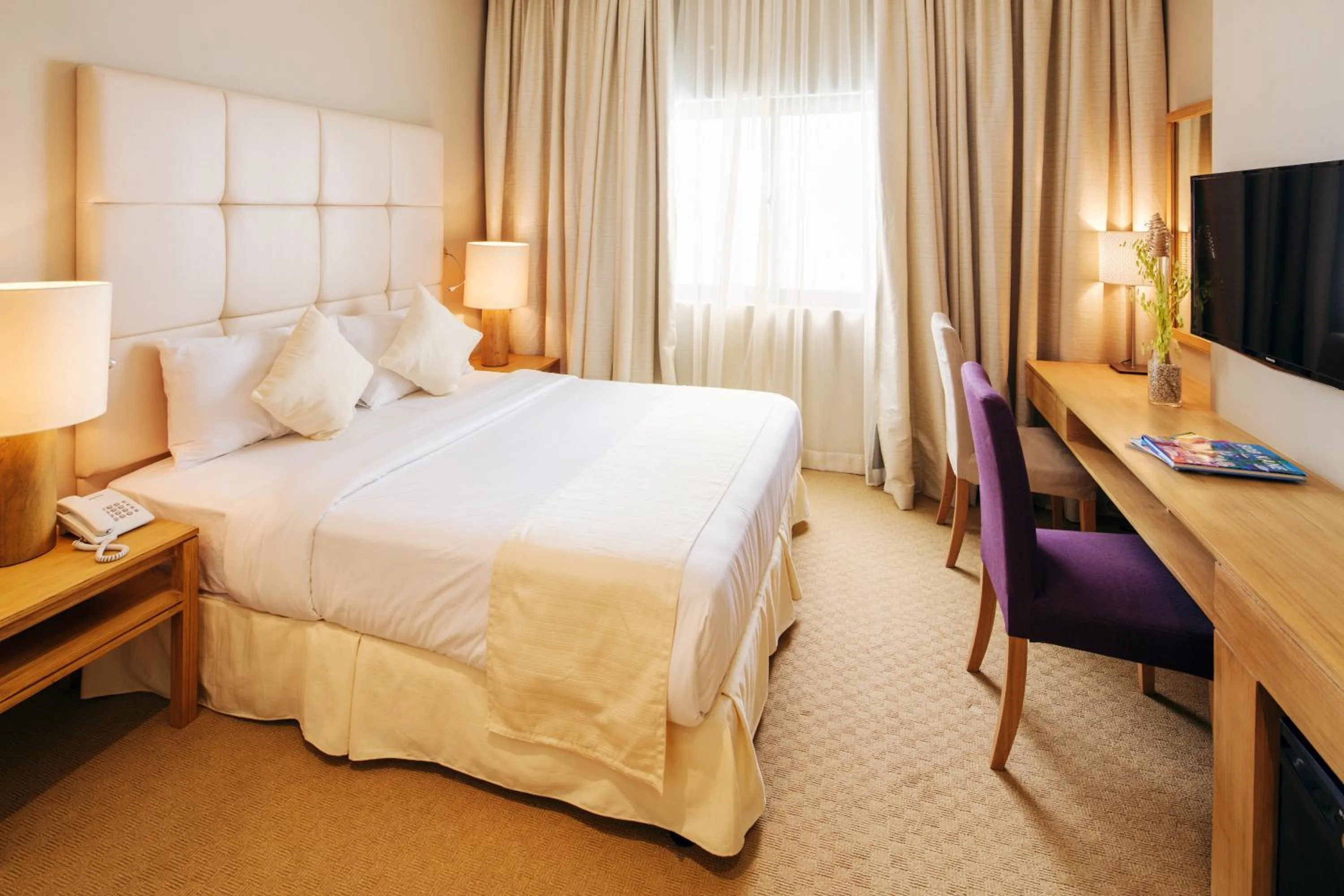 Bed in Villa Caemilla Beach Boutique Hotel