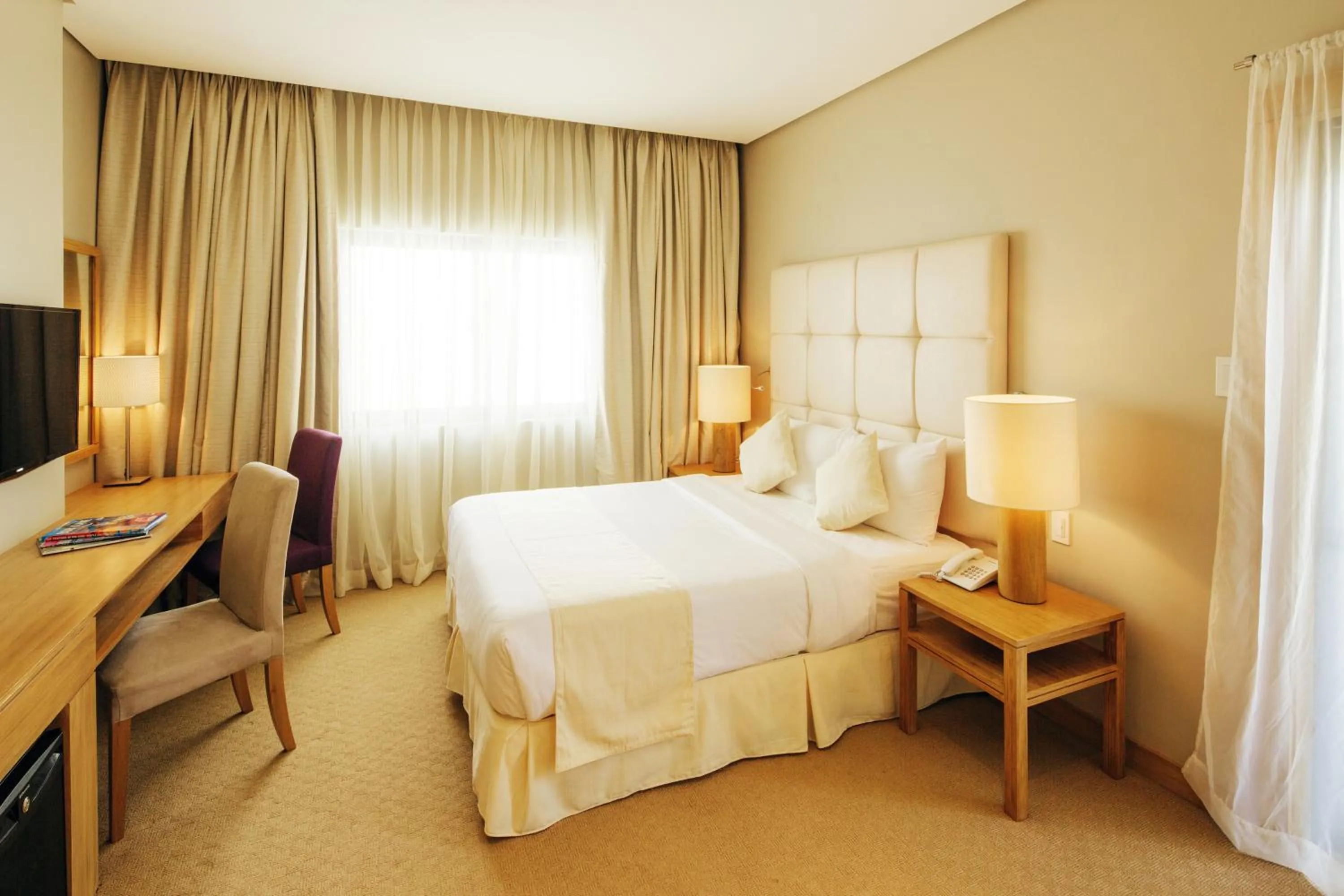 Bed in Villa Caemilla Beach Boutique Hotel