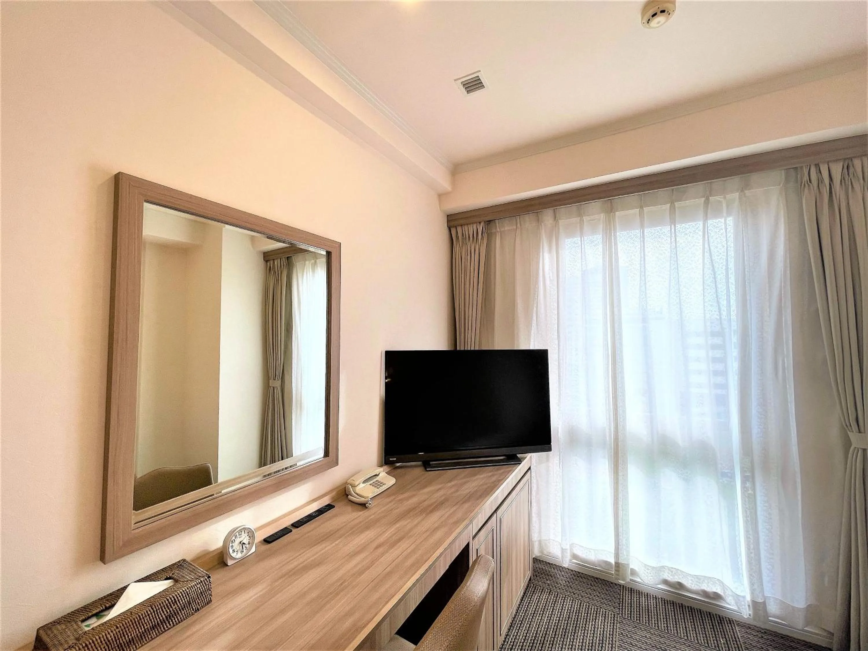 TV and multimedia in Libre Garden Hotel