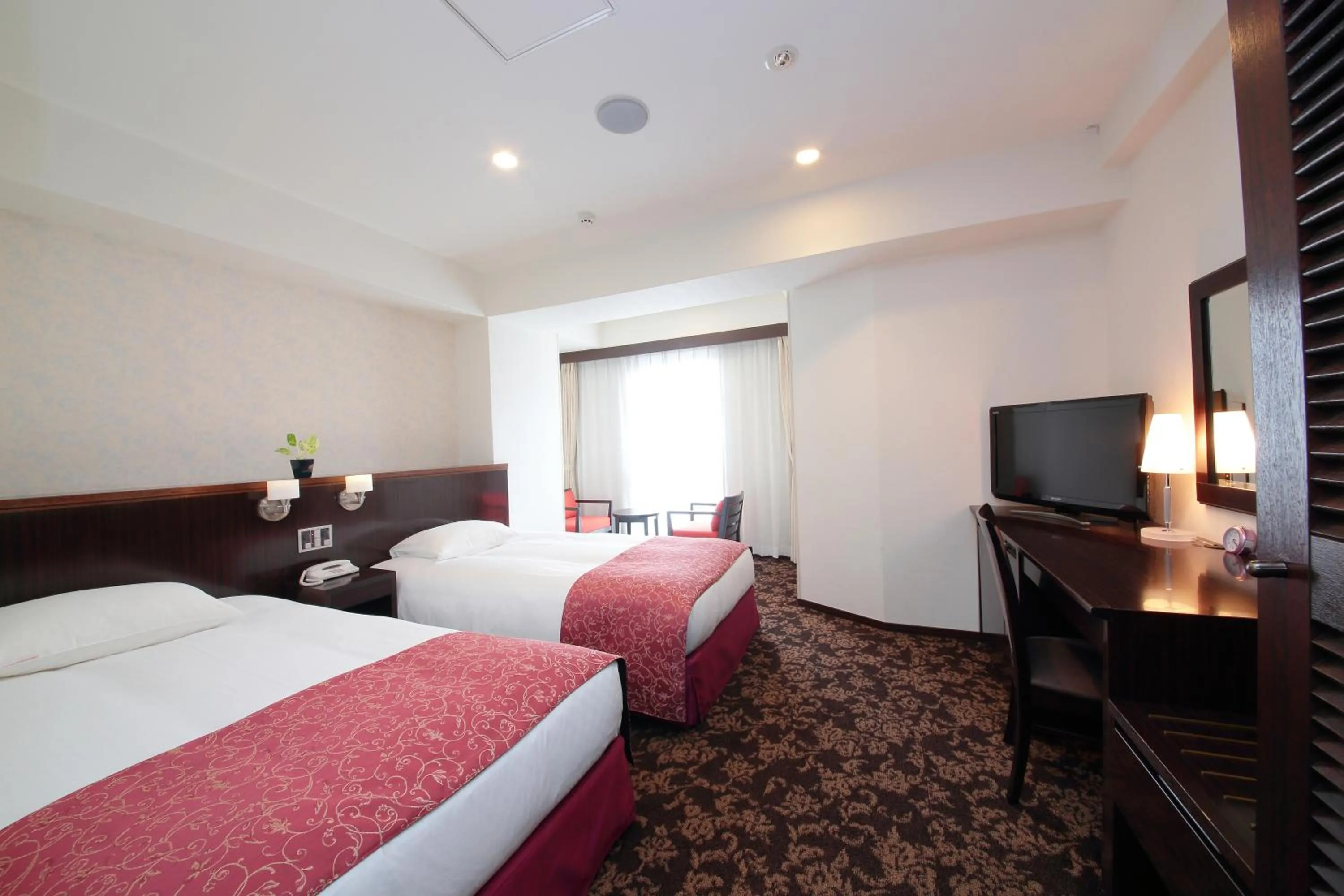 Photo of the whole room, Bed in Libre Garden Hotel