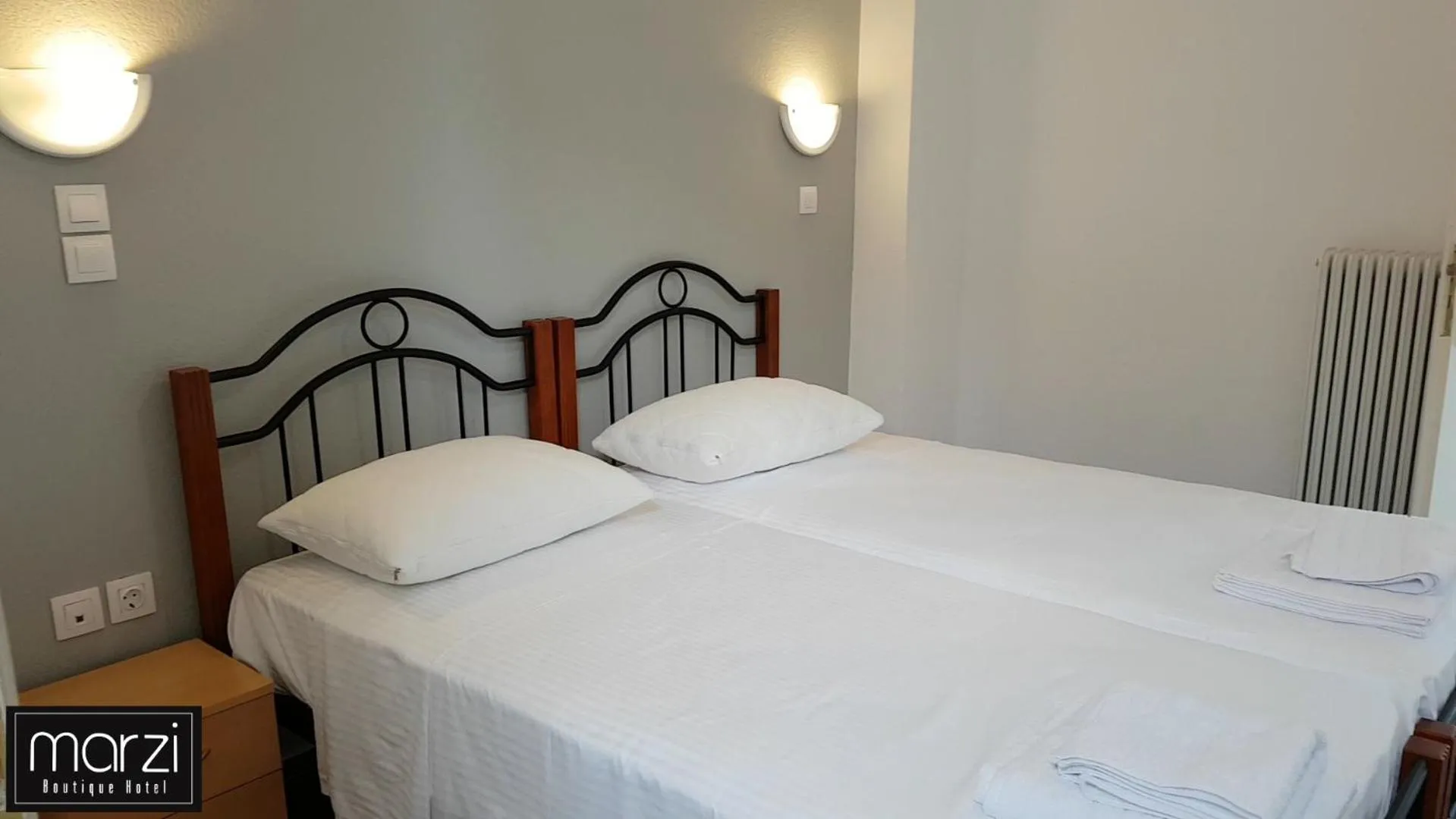 Bed in Marzi Boutique Hotel