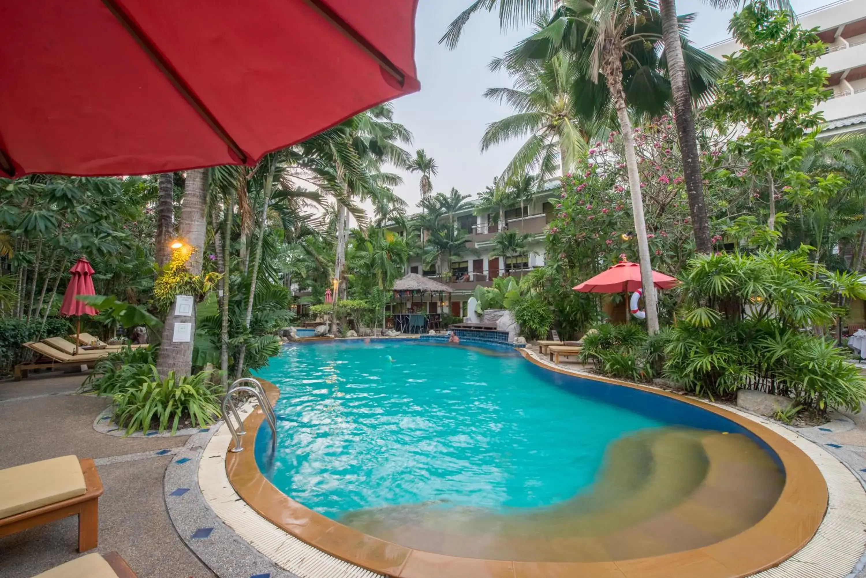 Swimming pool in The Viridian Resort - SHA Plus Swimming pool in The Viridian Resort - SHA Plus
