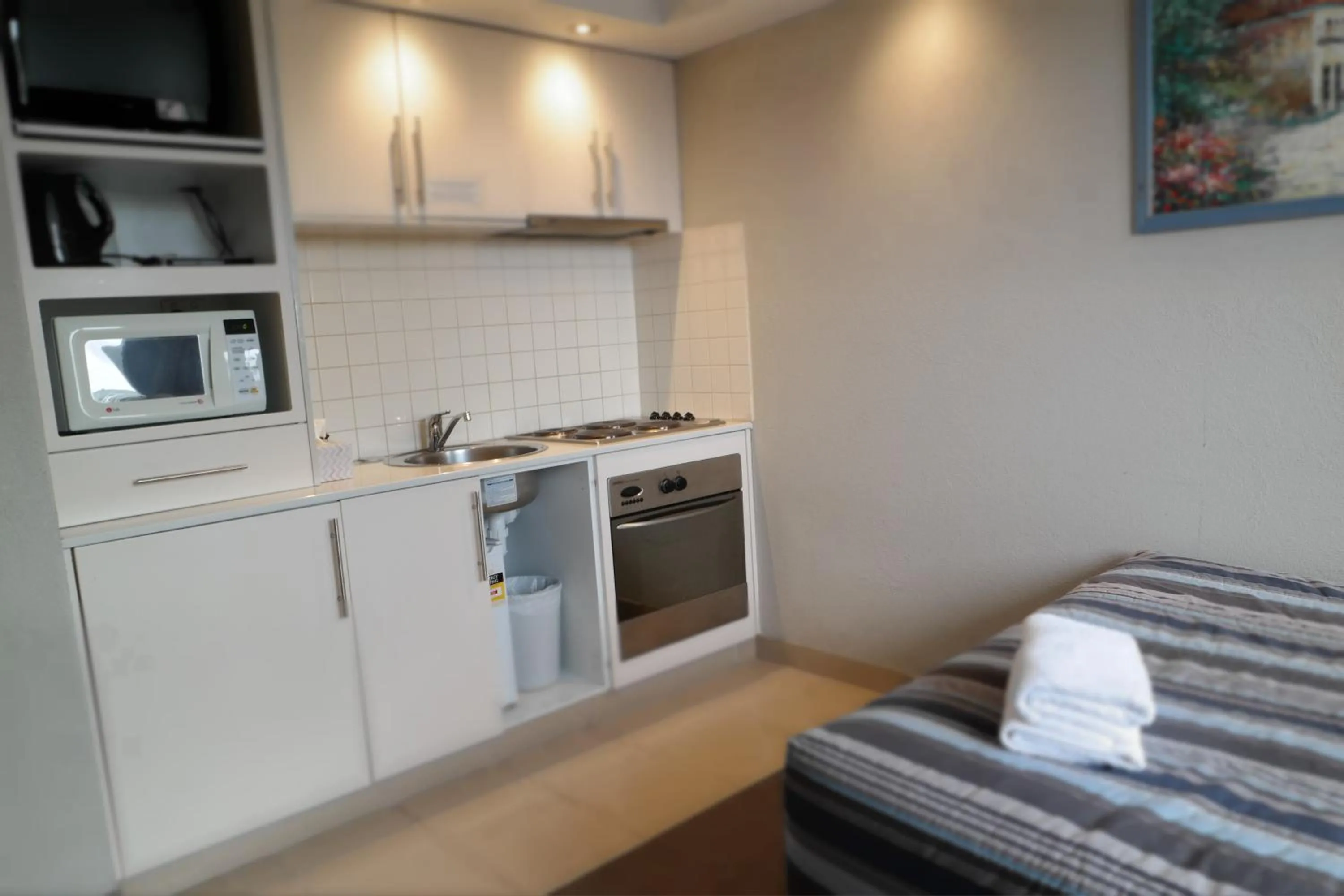 Kitchen or kitchenette in Parkville Place Serviced Apartments