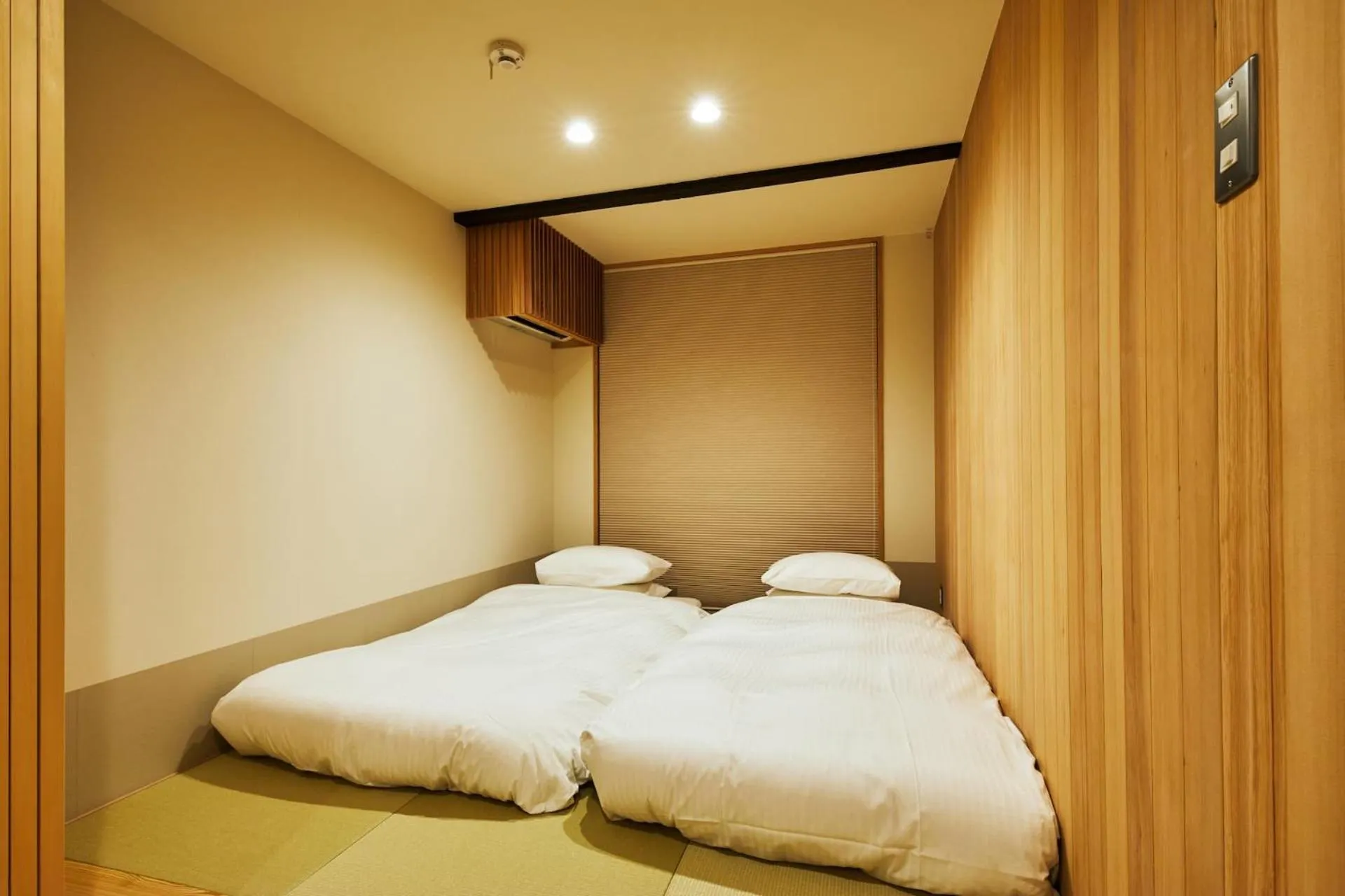 Bed in Gion Shirakawa no Yado