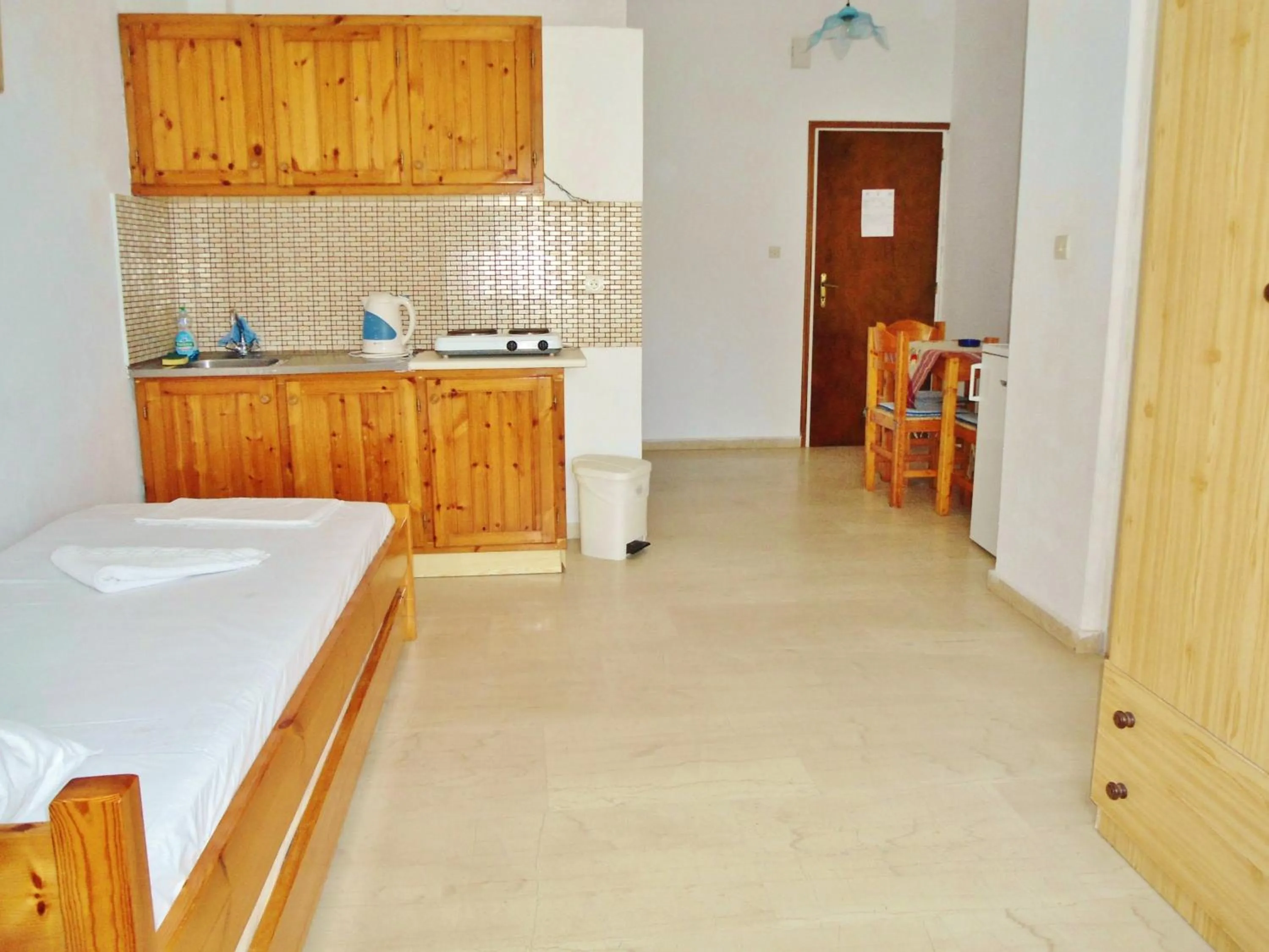 Bed in Apollonia Apartments