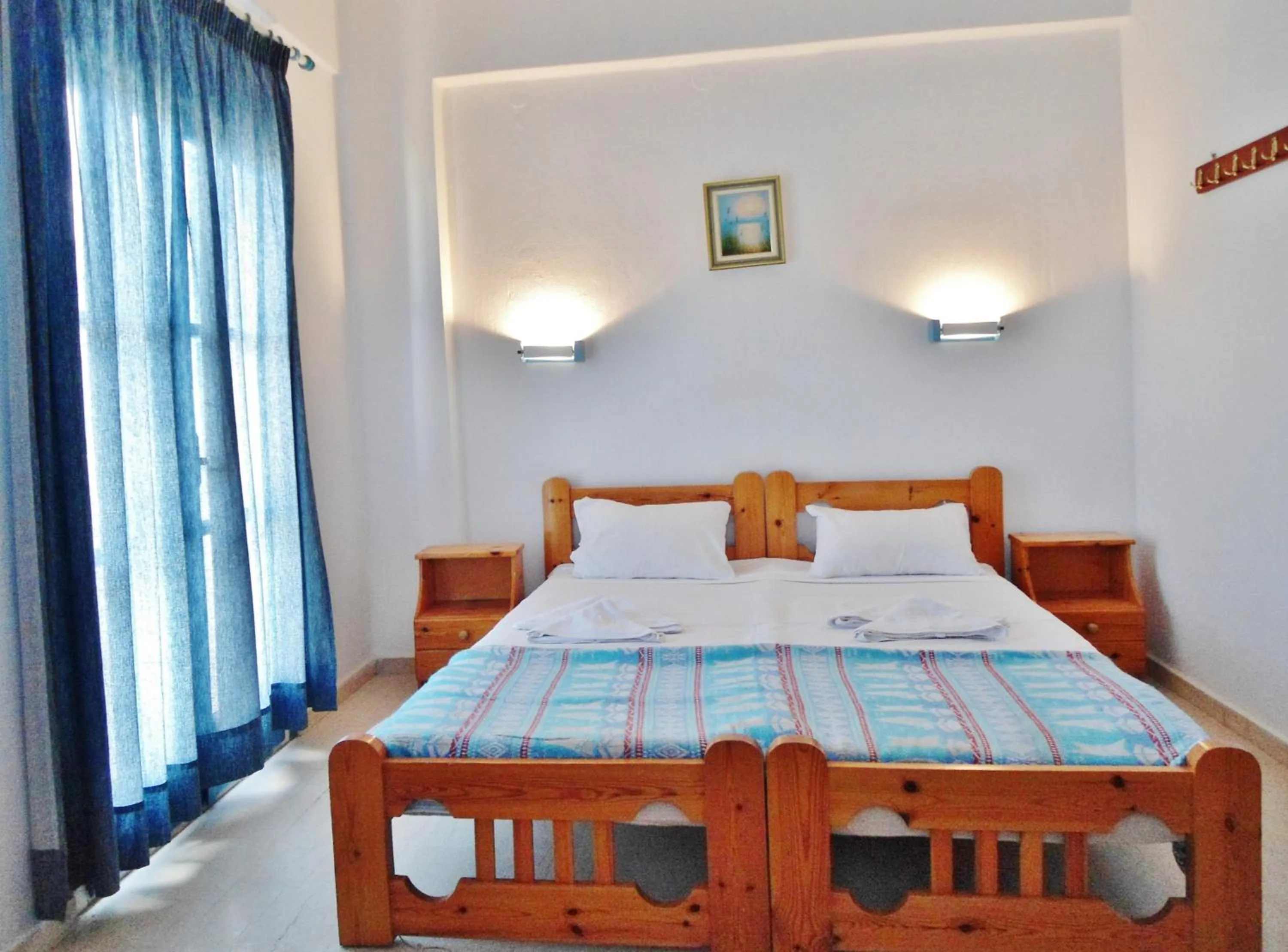 Bed in Apollonia Apartments