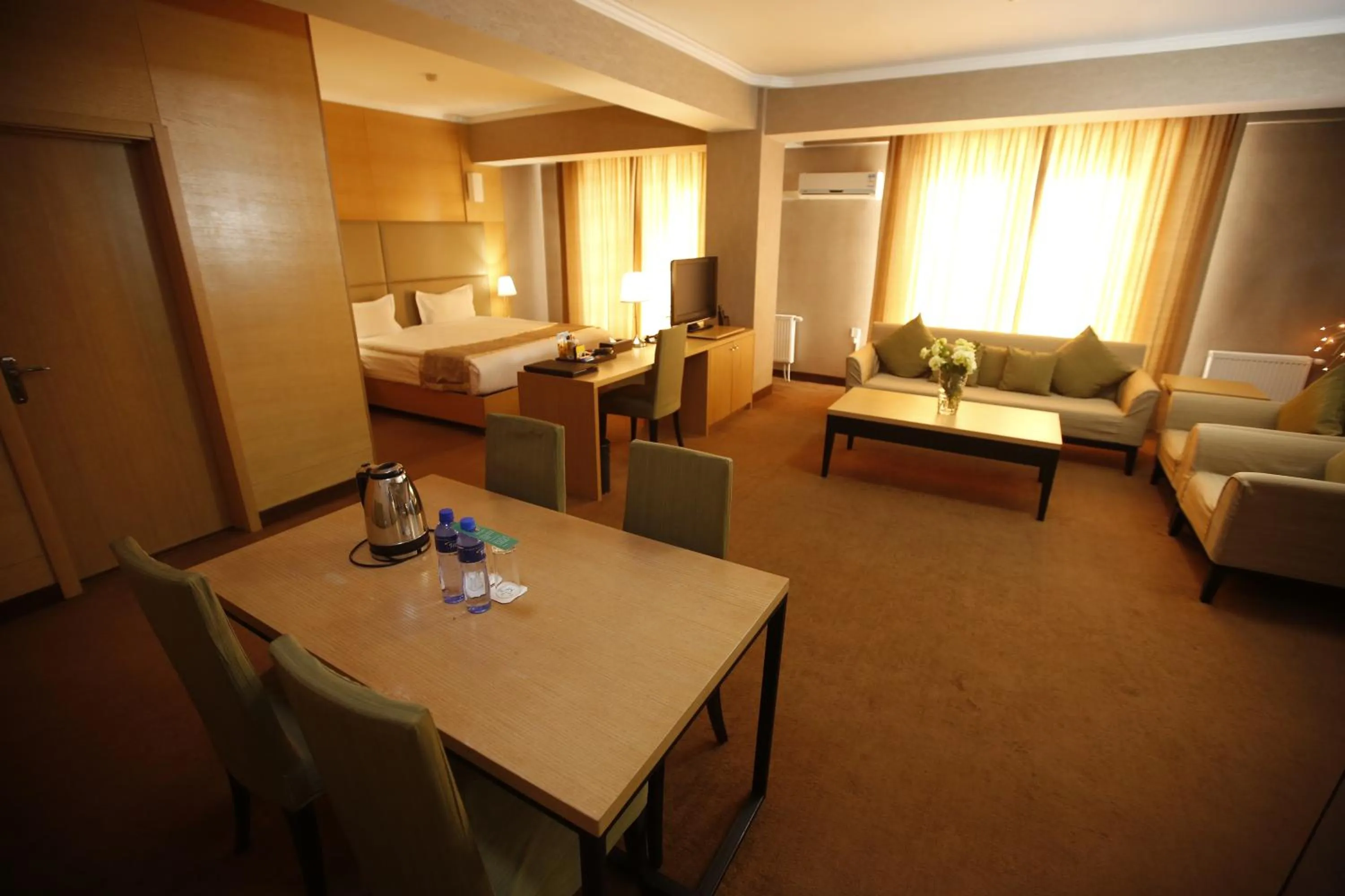 Bed in The Corporate Hotel