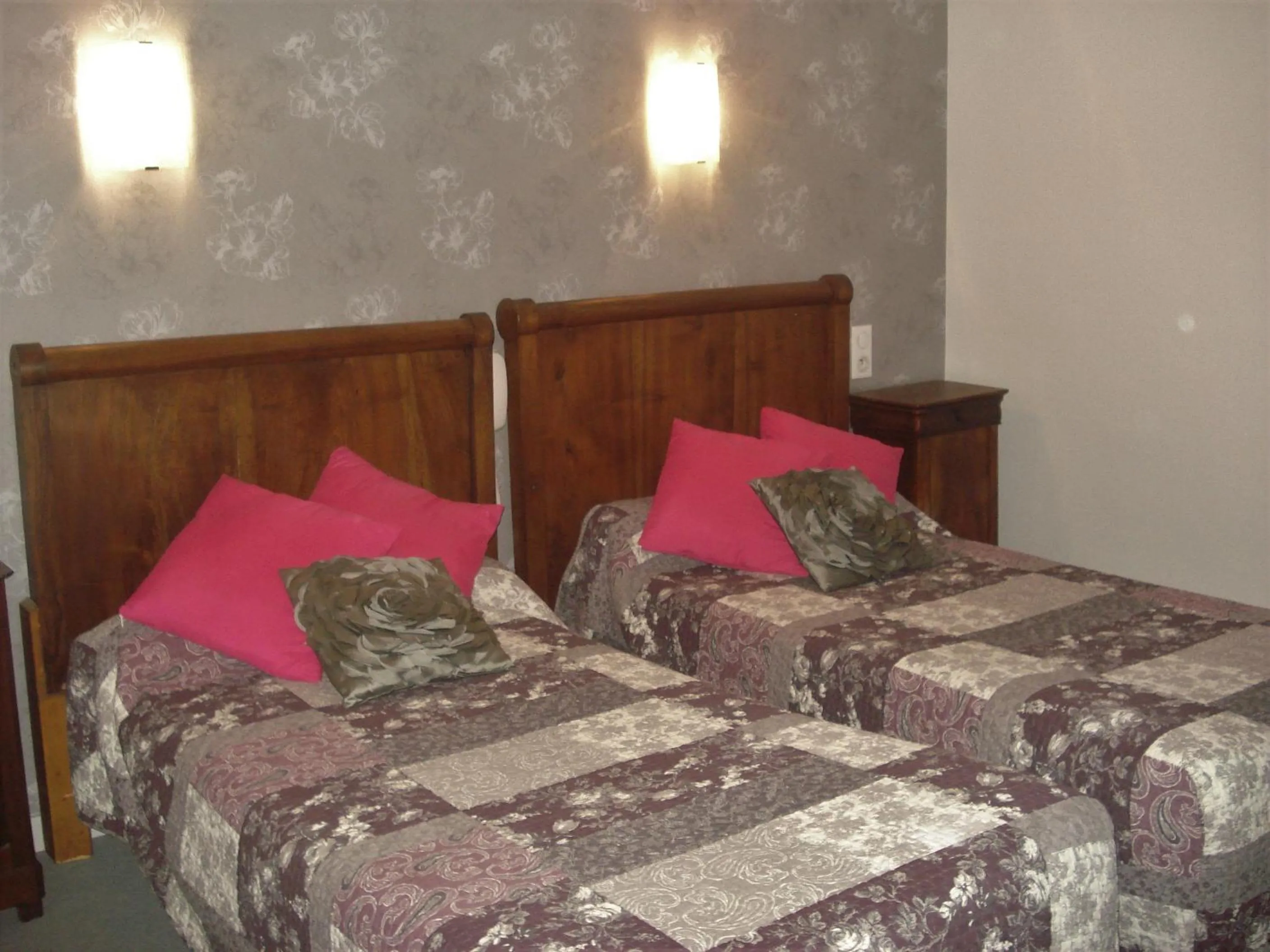 Bed in Auberge Aux Portes de Conques