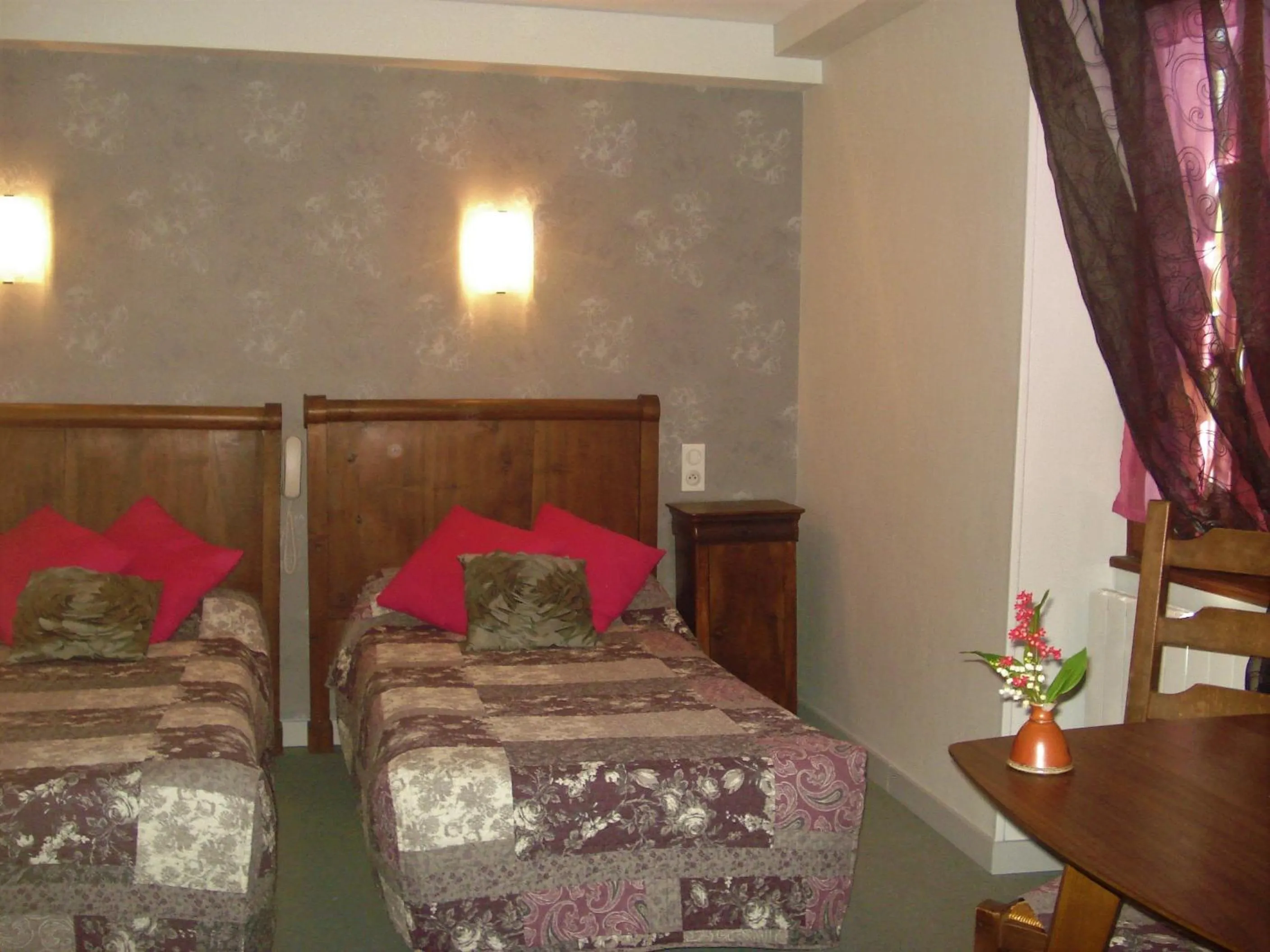 Bed in Auberge Aux Portes de Conques