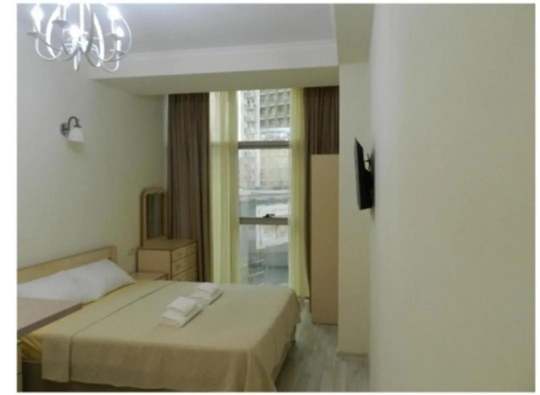 Bed in Subtropic Apartments