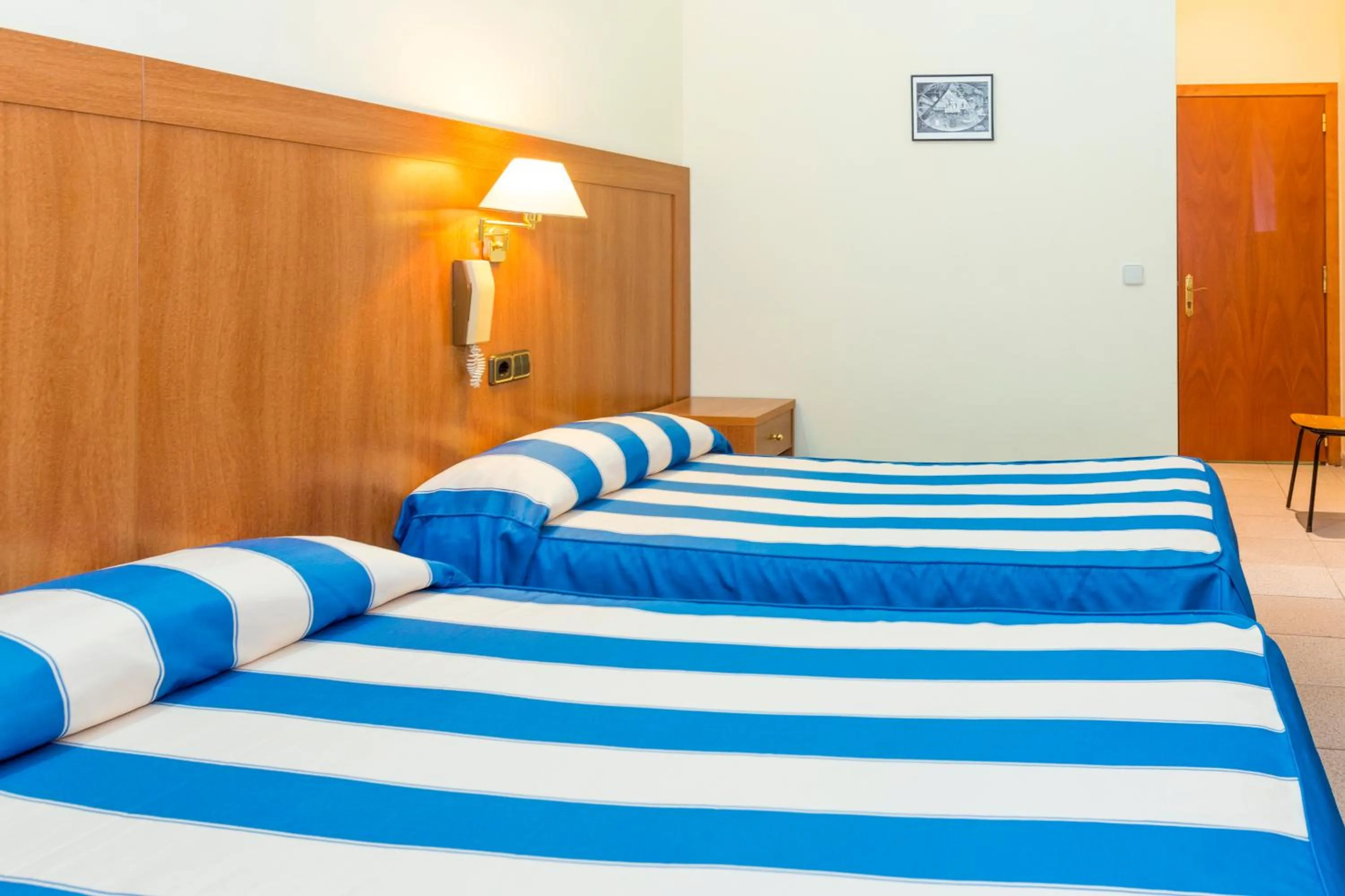 Photo of the whole room, Bed in Pensión Coral