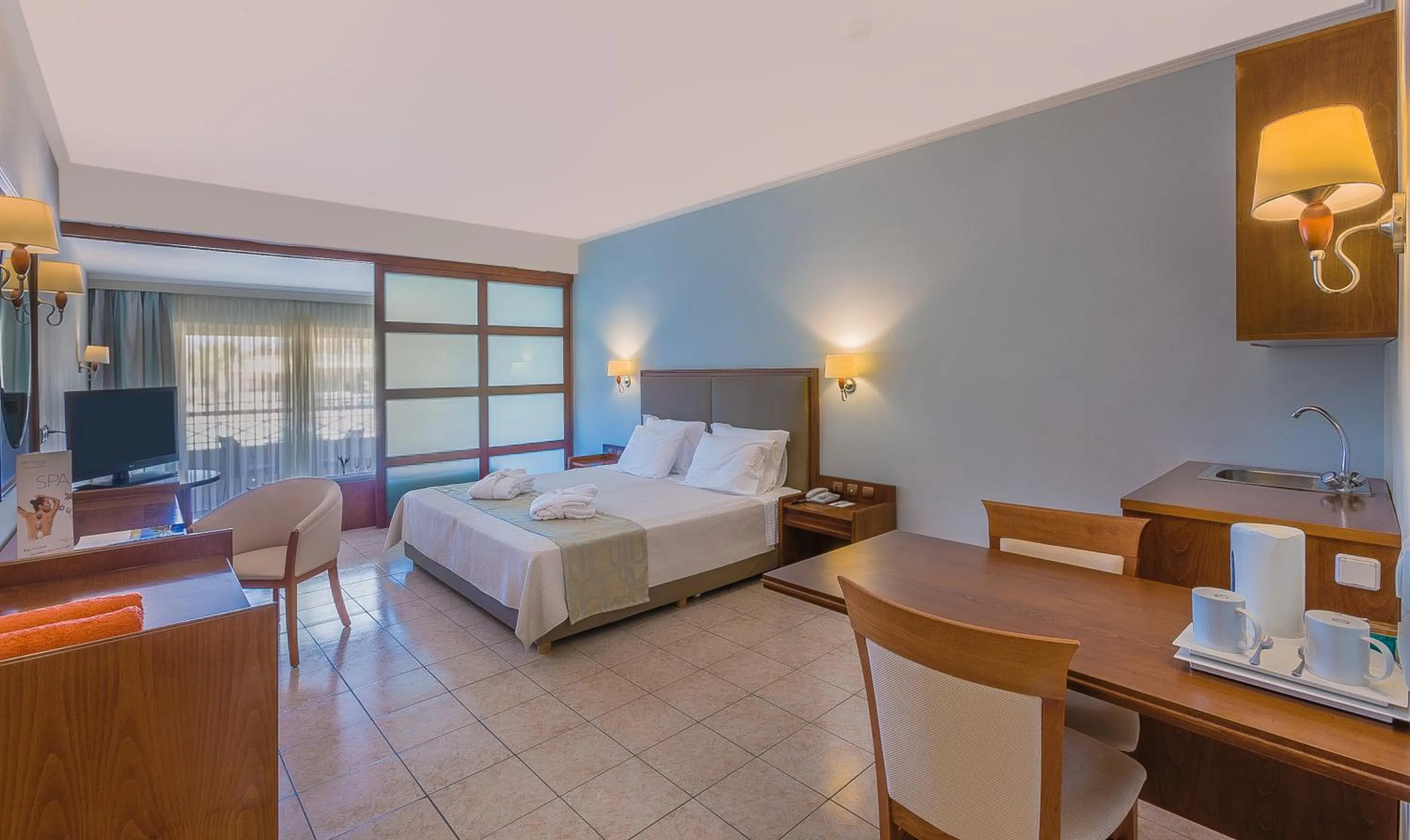 Bed in Kipriotis Maris Suites
