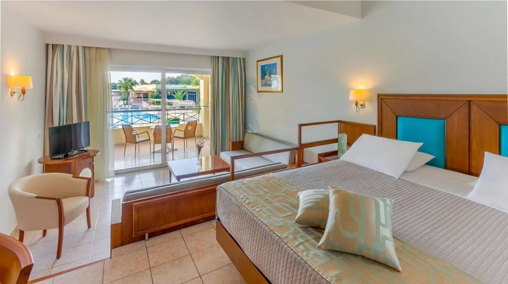 Bed in Kipriotis Maris Suites