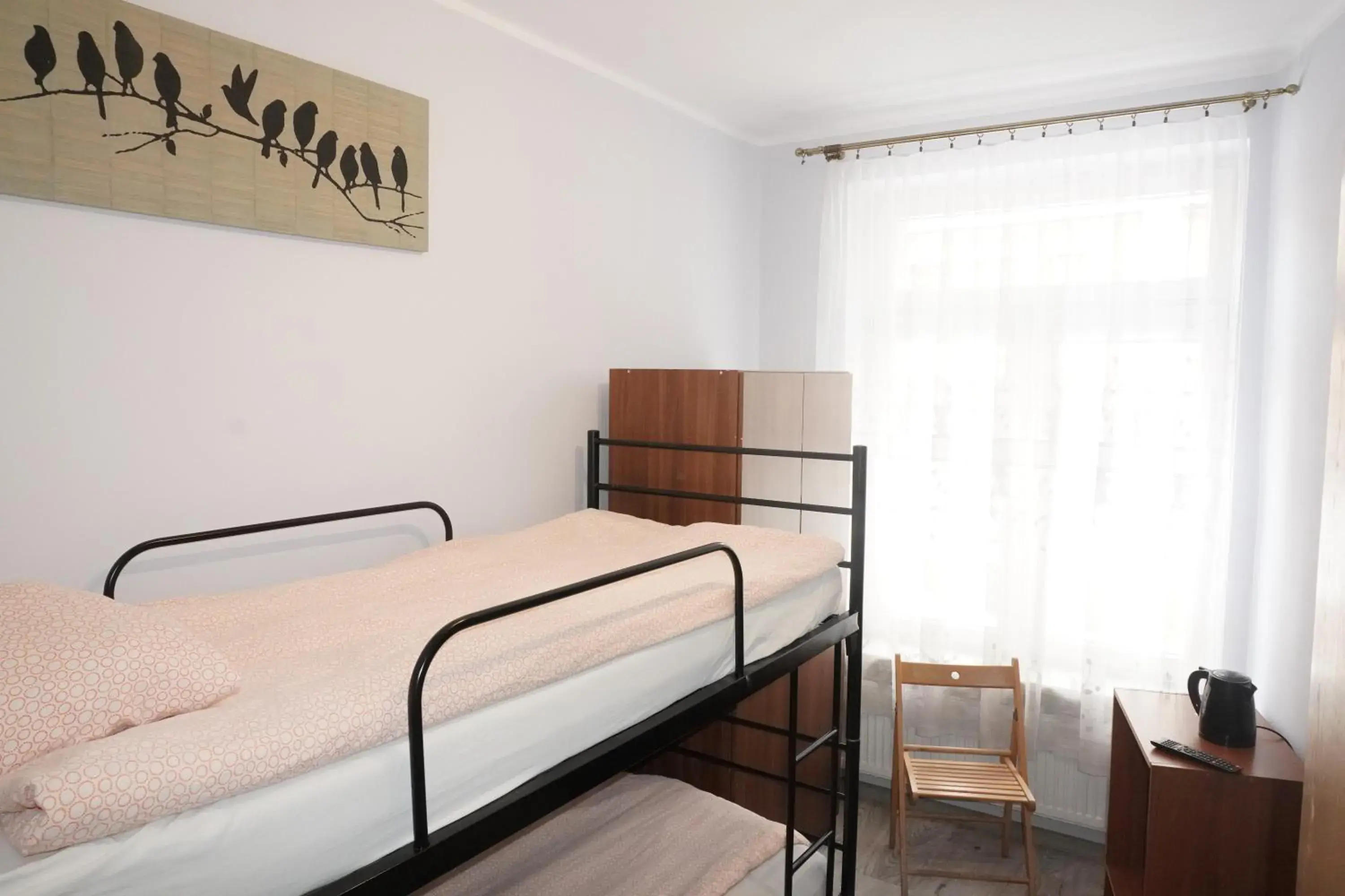 Basic Triple Room with Shared Bathroom in Hostel4u Basic Triple Room with Shared Bathroom in Hostel4u