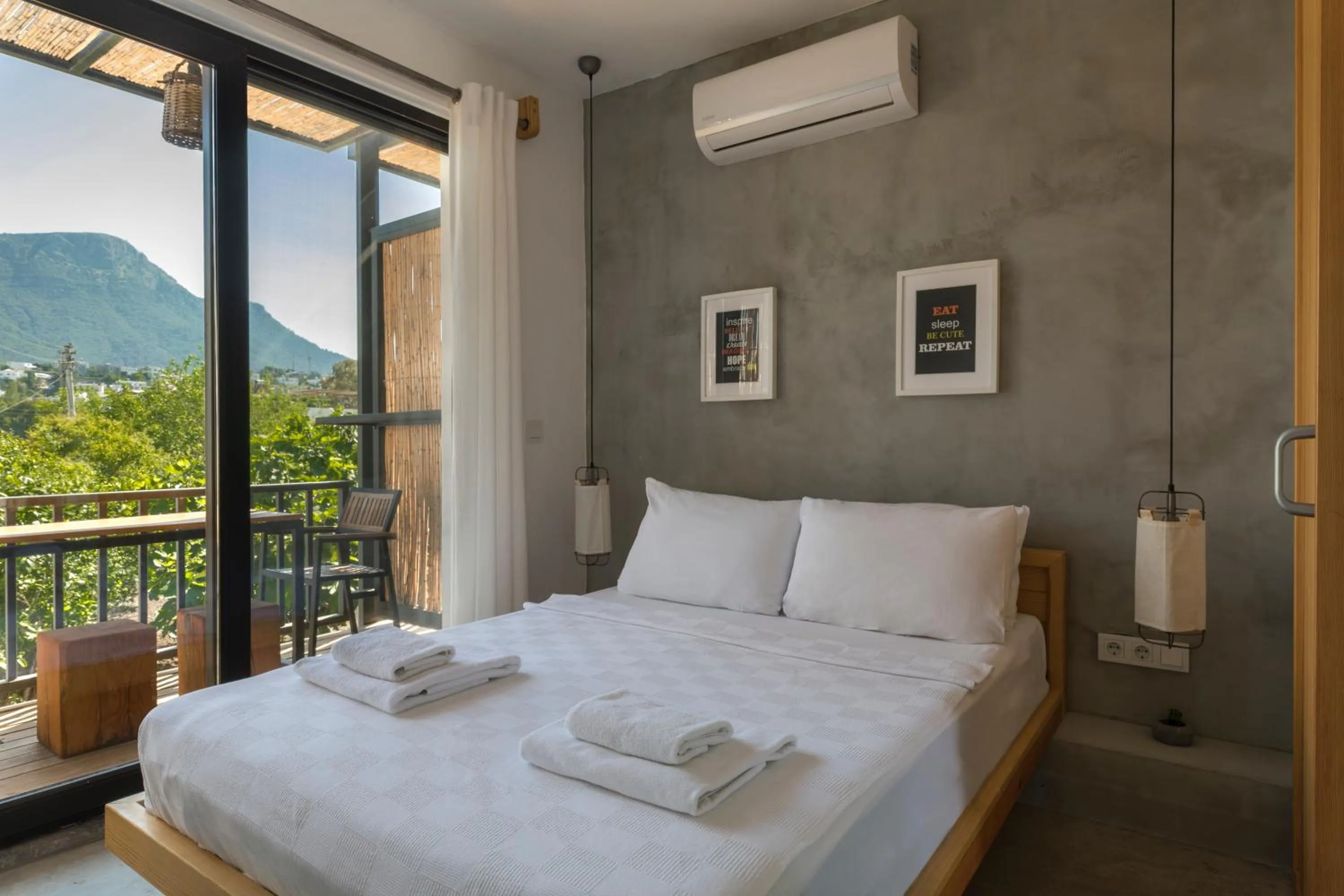 Bed in Daphnis Hotel