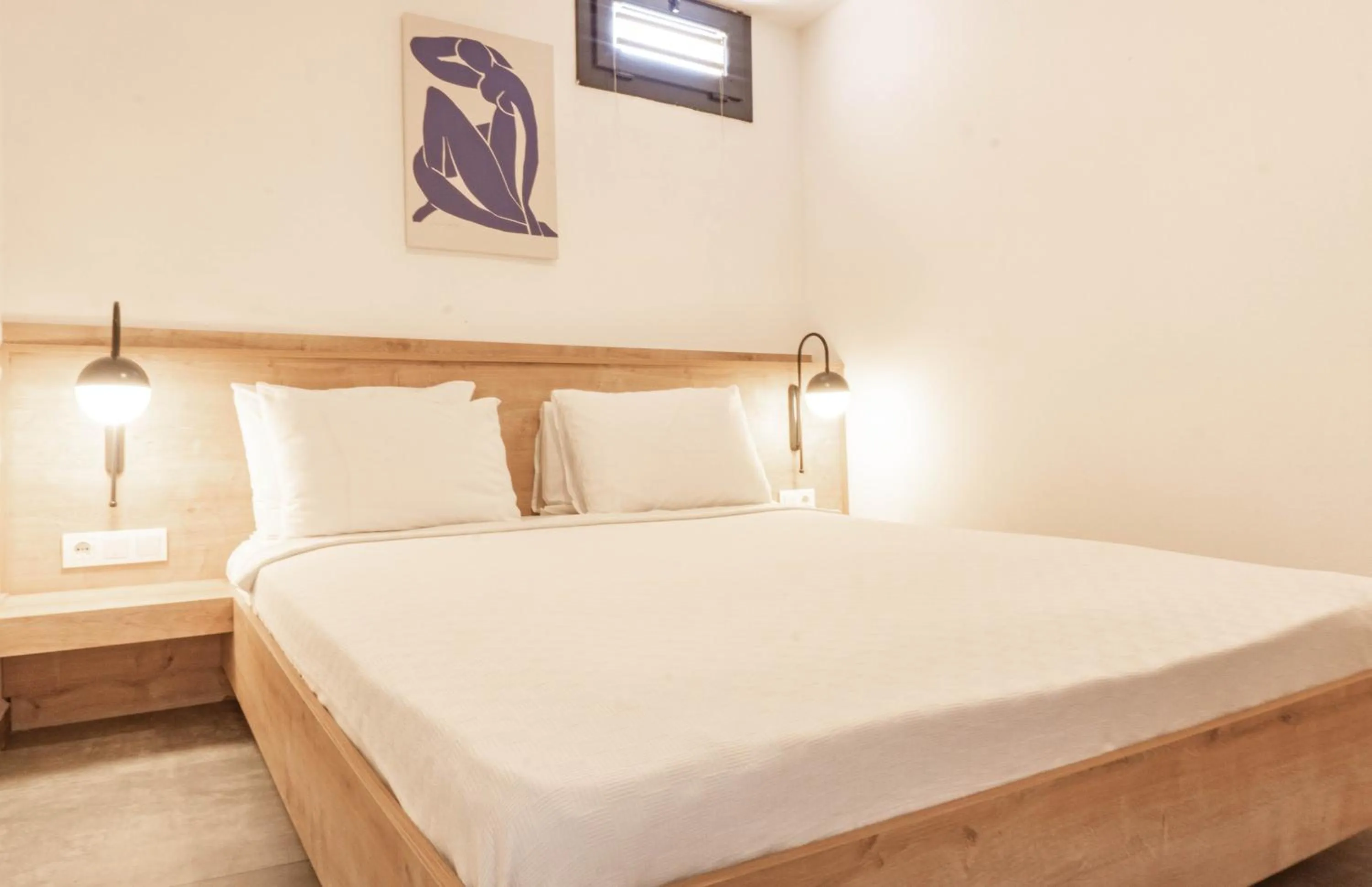 Bed in Daphnis Hotel