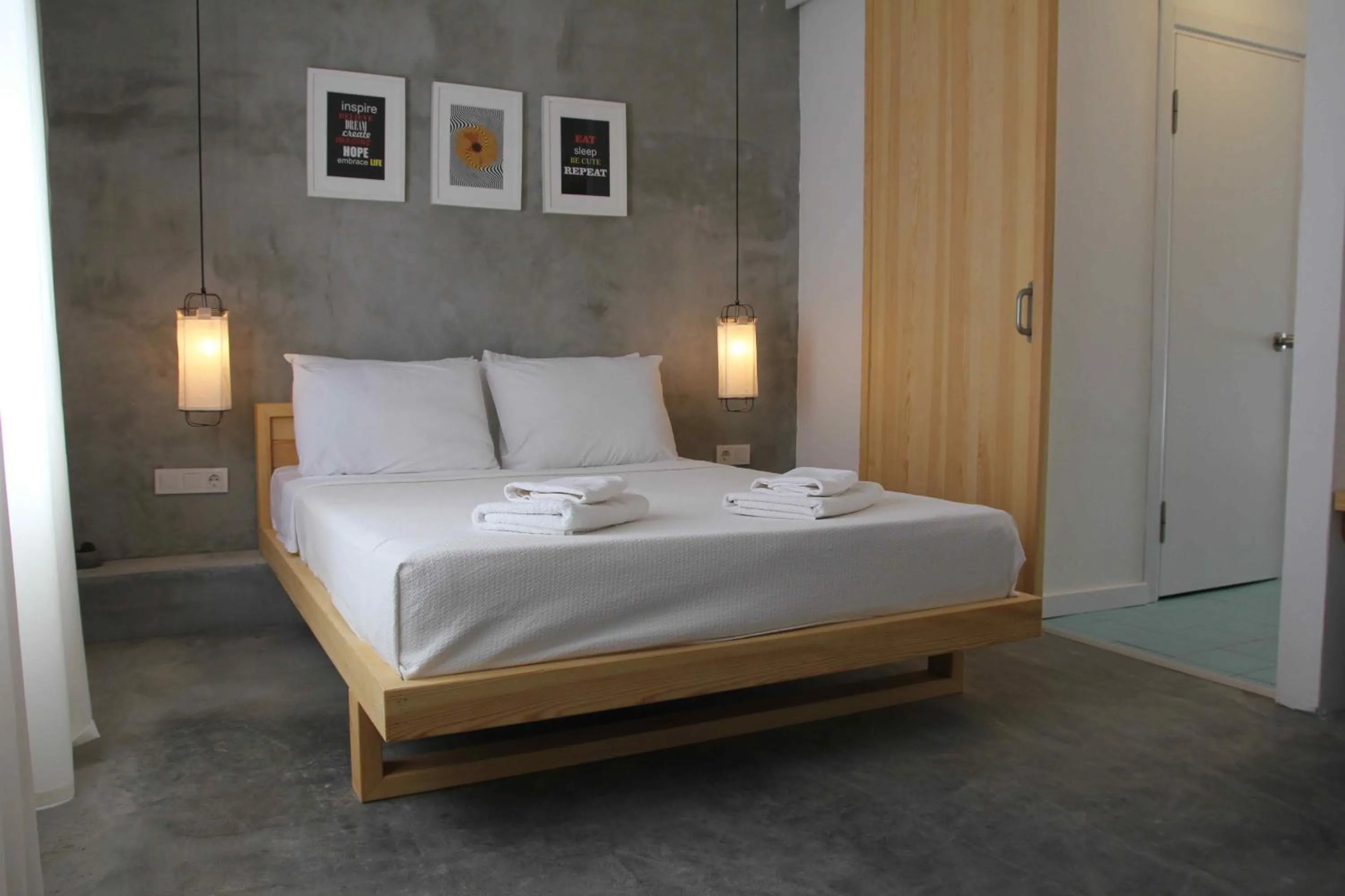 Bed in Daphnis Hotel