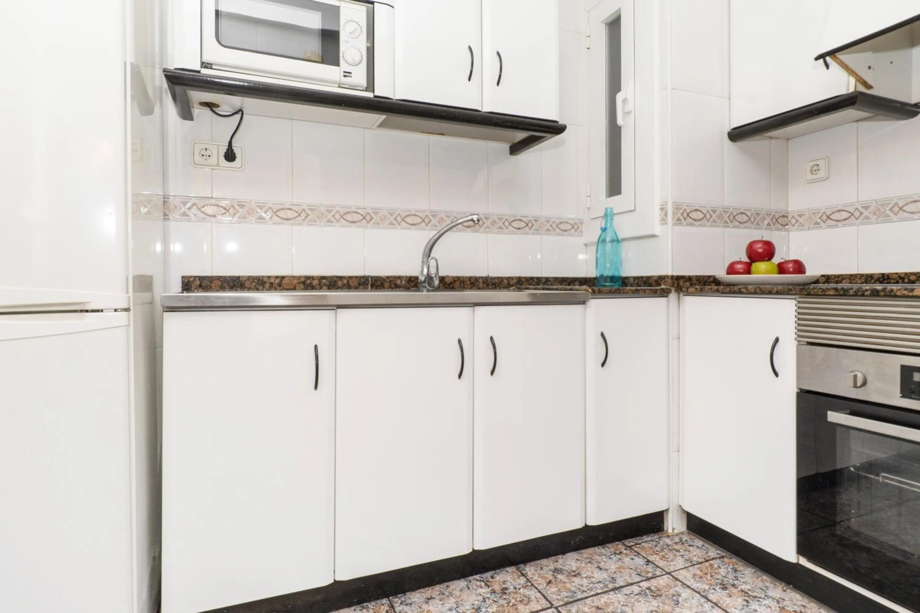 Kitchen or kitchenette in Rentalmar Family Felix con parking incluido