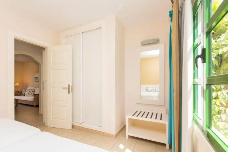 Bedroom, Bed in Apartamentos LIVVO Puerto de Mogán