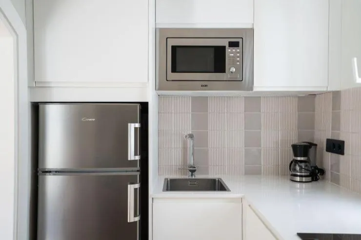 Kitchen or kitchenette in Apartamentos LIVVO Puerto de Mogán