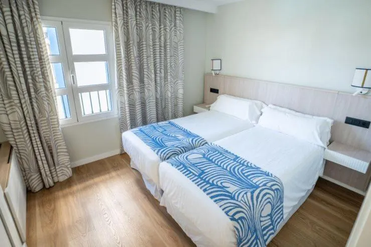 Bedroom, Bed in Apartamentos LIVVO Puerto de Mogán