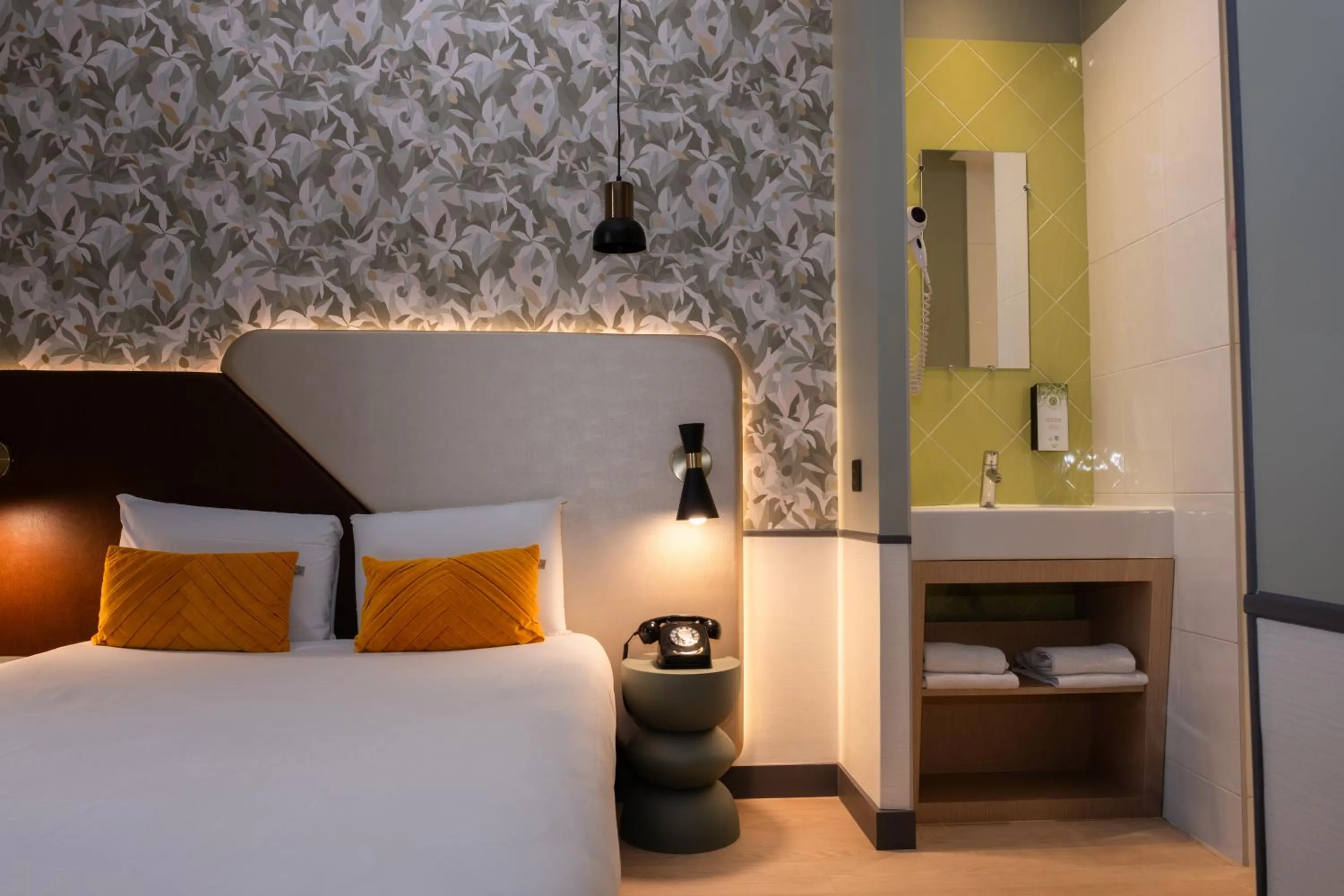 Bathroom, Bed in Kyriad Paris 10 - Canal Saint Martin - République