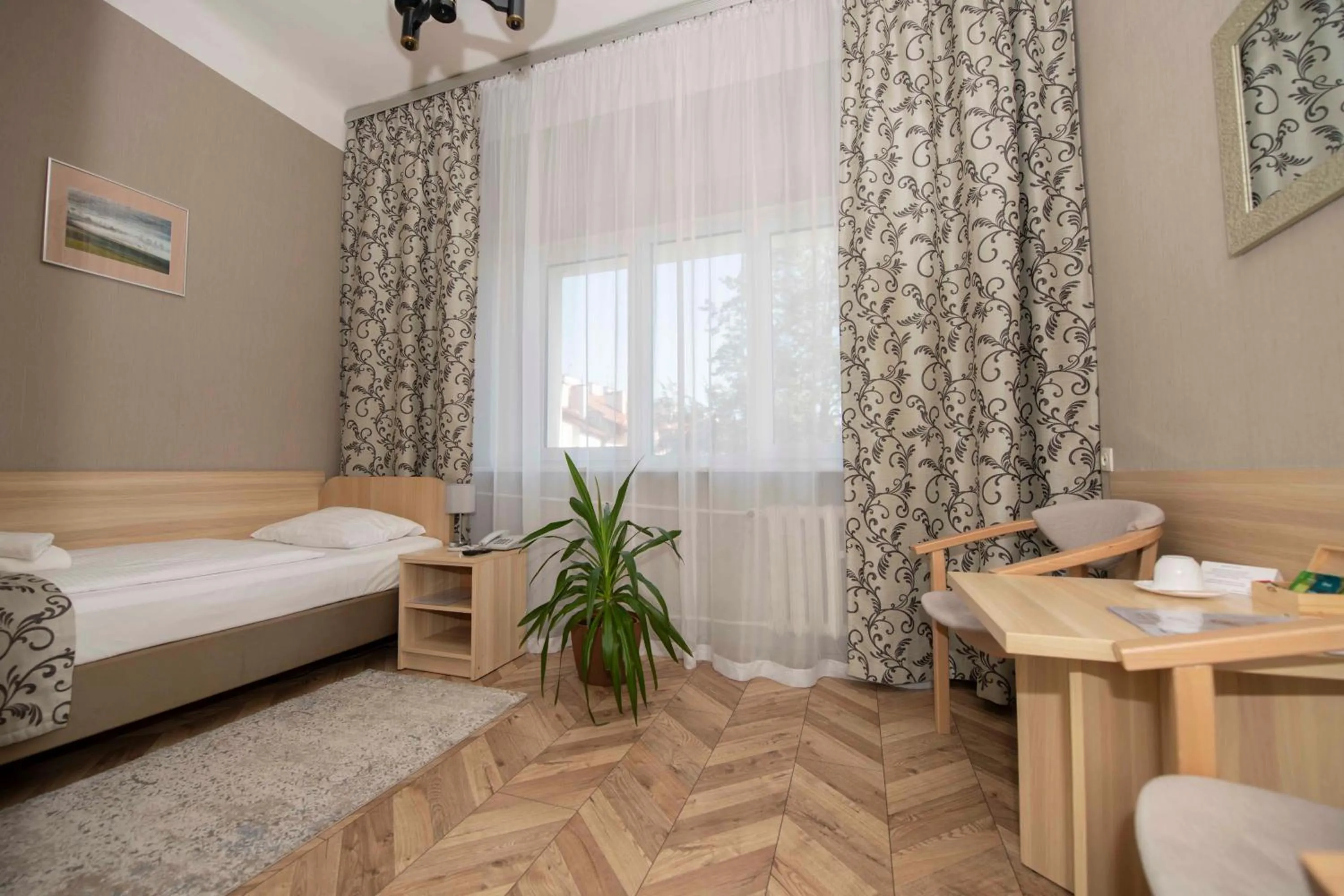 Seating area, Bed in Hotel Polonia