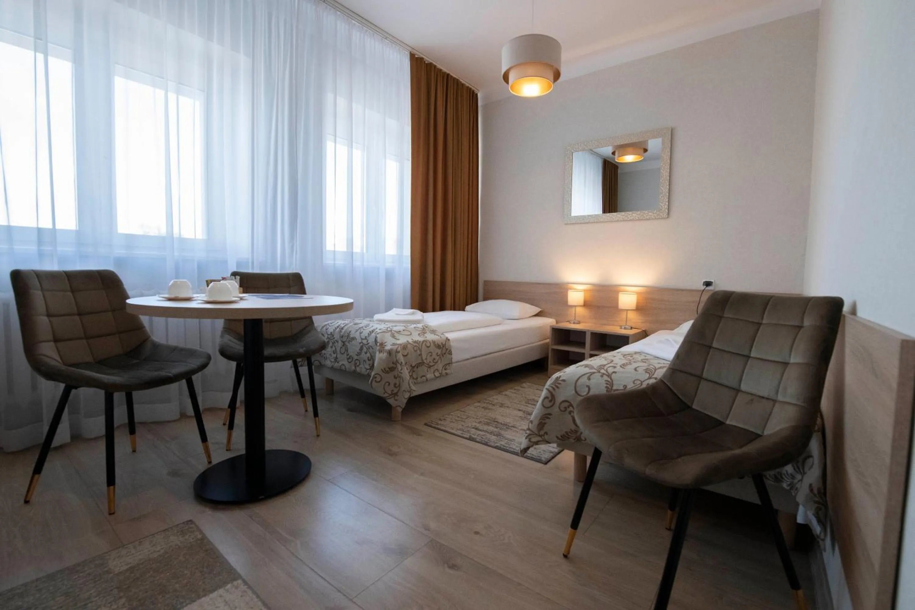 Seating area, Bed in Hotel Polonia